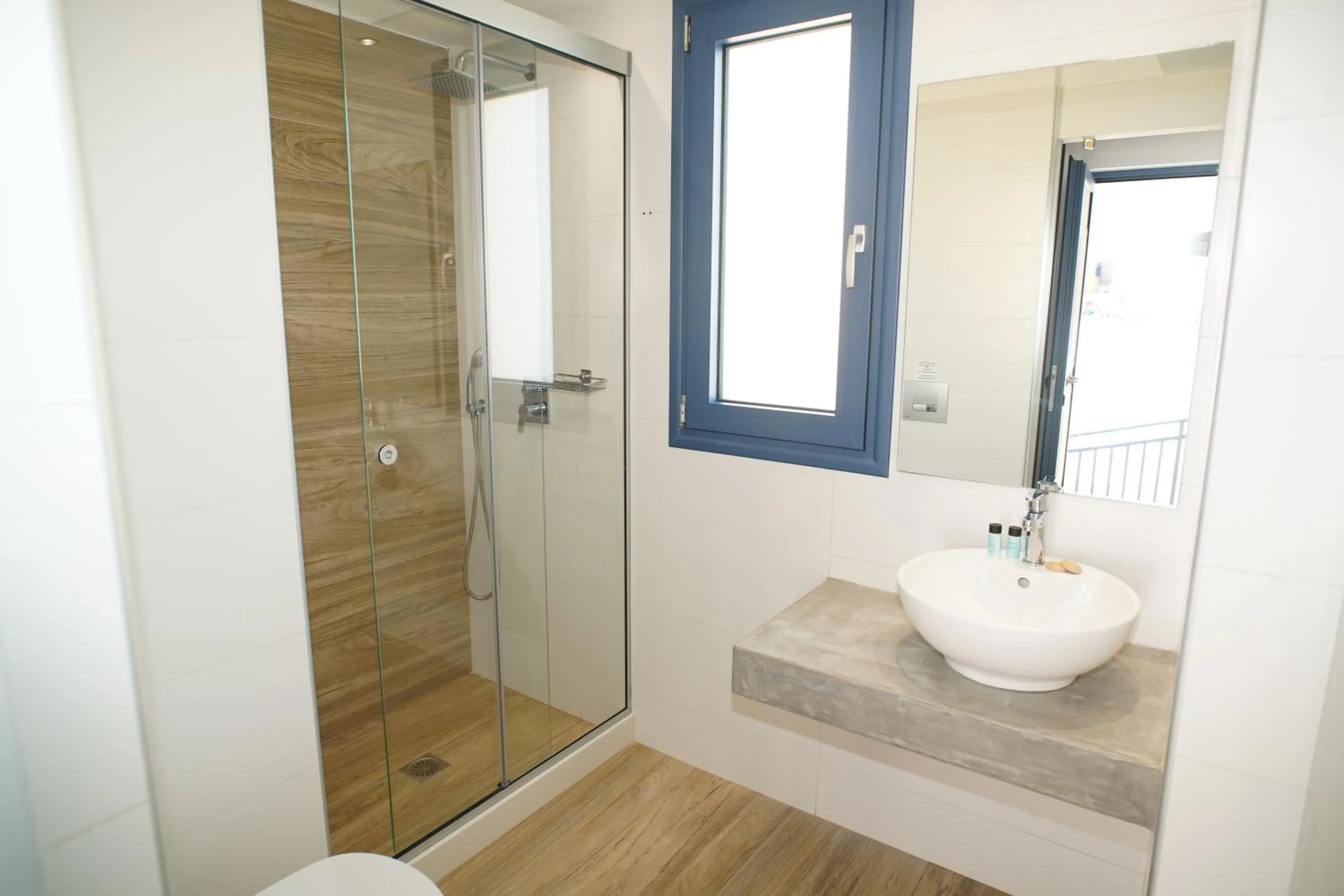 Shower in Astra Village & Suites