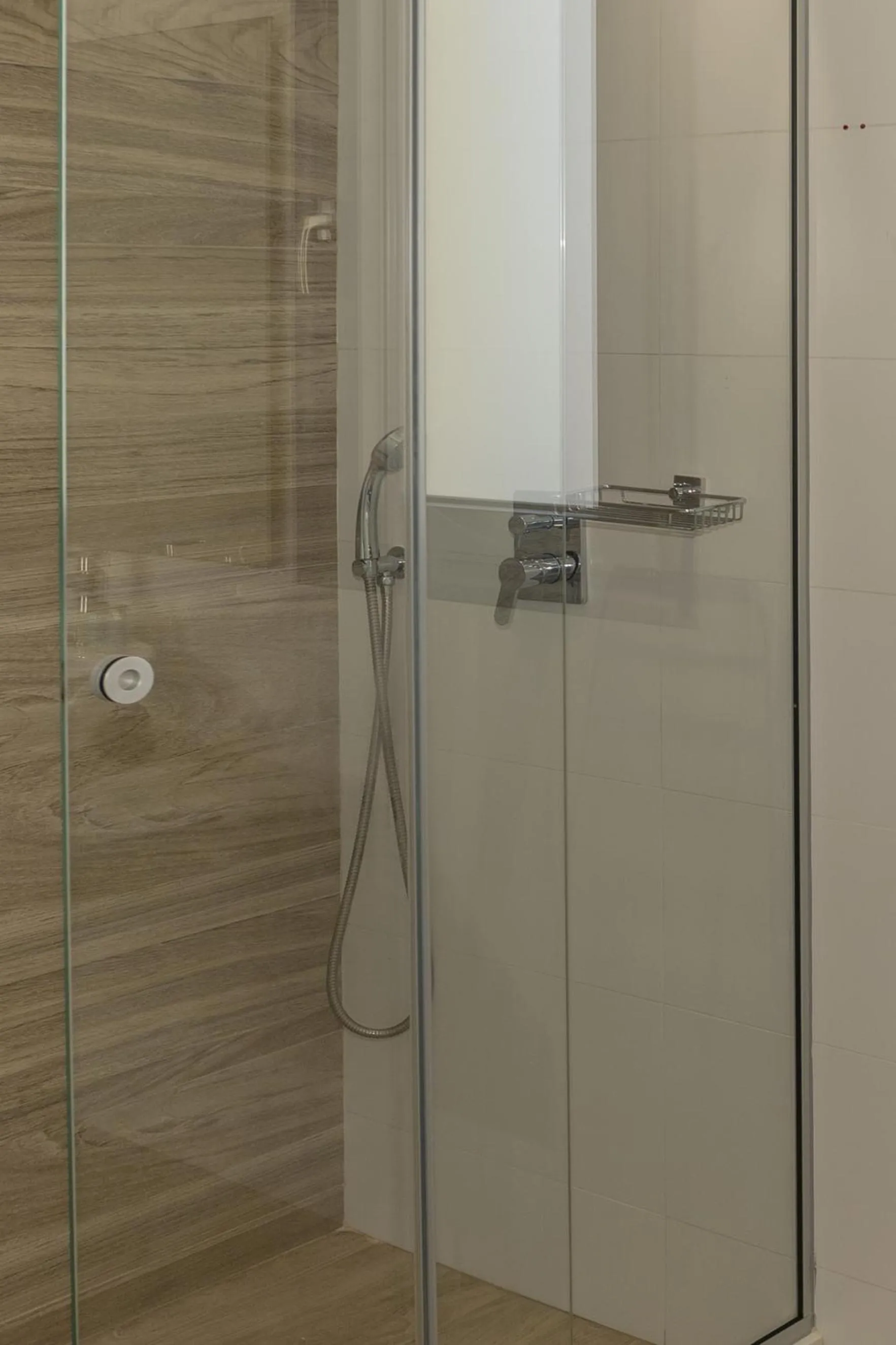 Shower in Astra Village & Suites