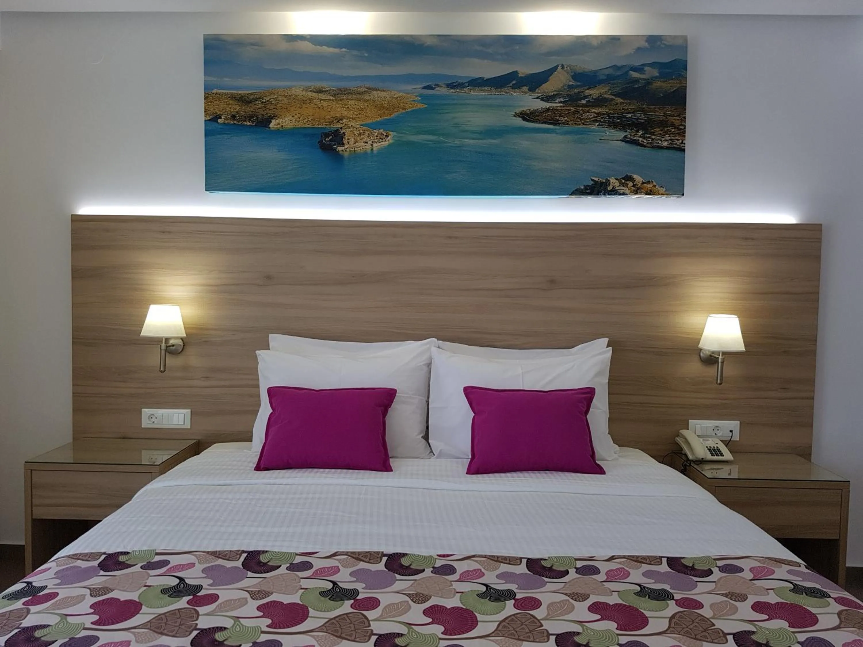 Bed in Astra Village & Suites