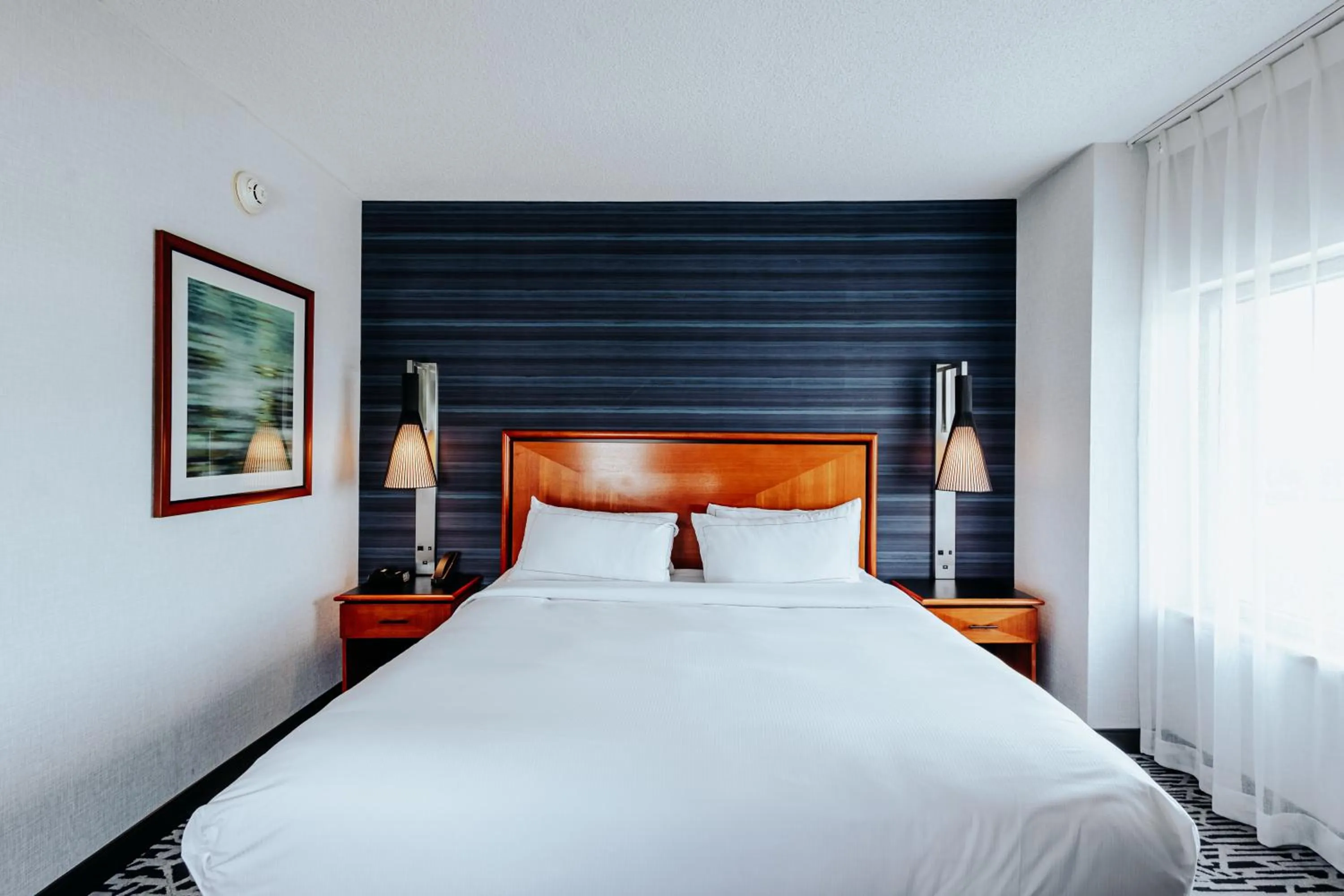 Bed in DoubleTree Suites by Hilton Hotel & Conference Center Chicago-Downers Grove