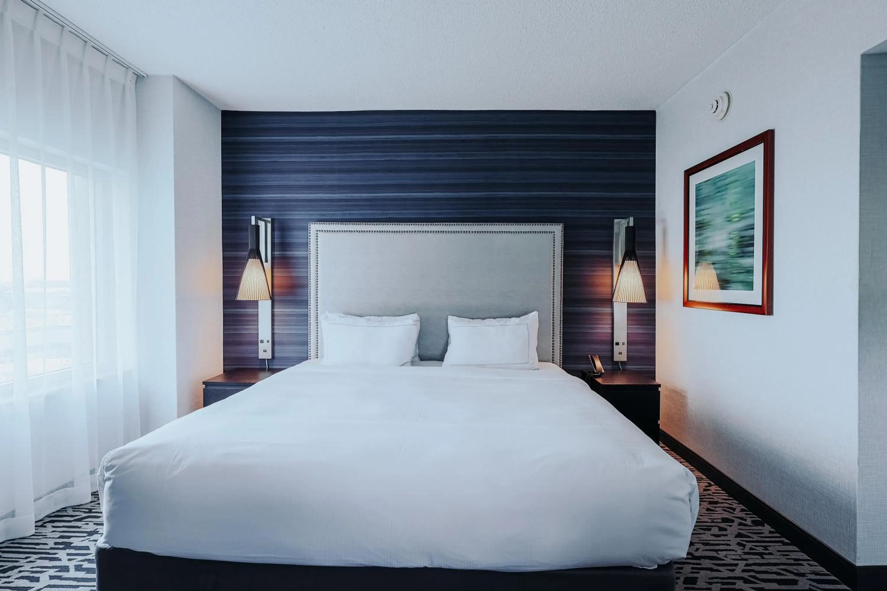 Bed in DoubleTree Suites by Hilton Hotel & Conference Center Chicago-Downers Grove