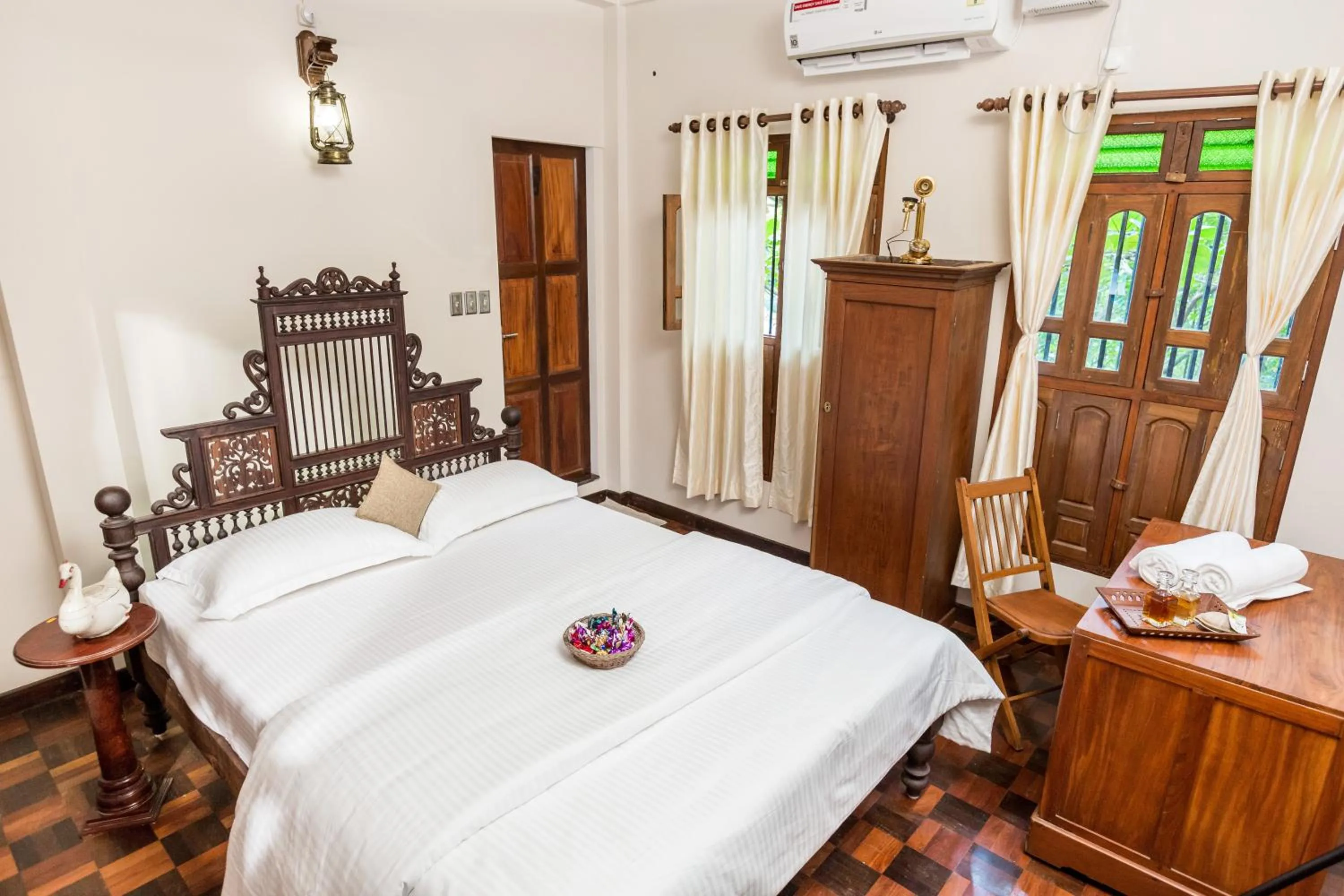 Bed in Kumarakom Wood Castle Serviced Appartments