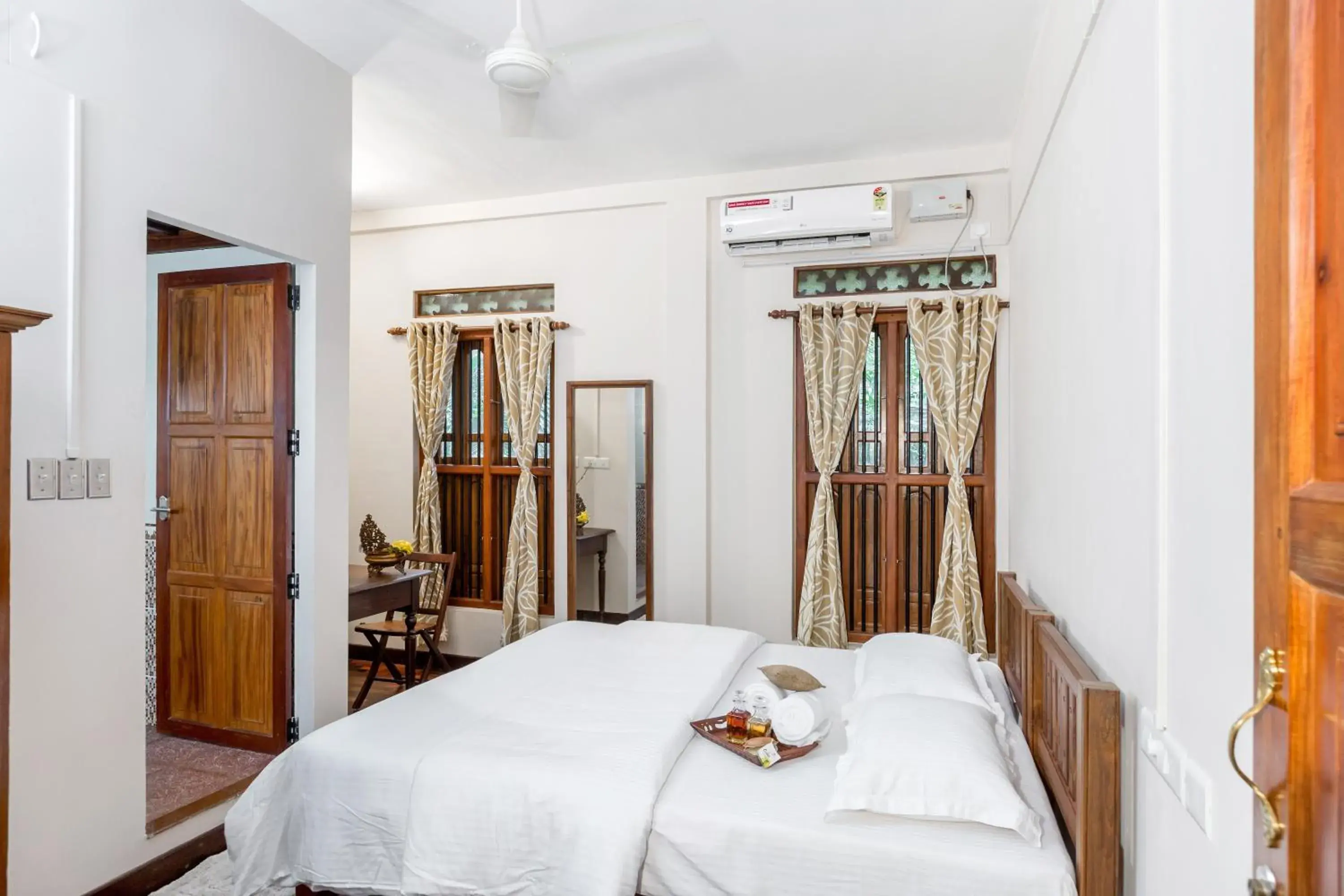 Deluxe Double Room (2 Adults + 1 Child) - single occupancy in Kumarakom Wood Castle Serviced Appartments Deluxe Double Room (2 Adults + 1 Child) - single occupancy in Kumarakom Wood Castle Serviced Appartments
