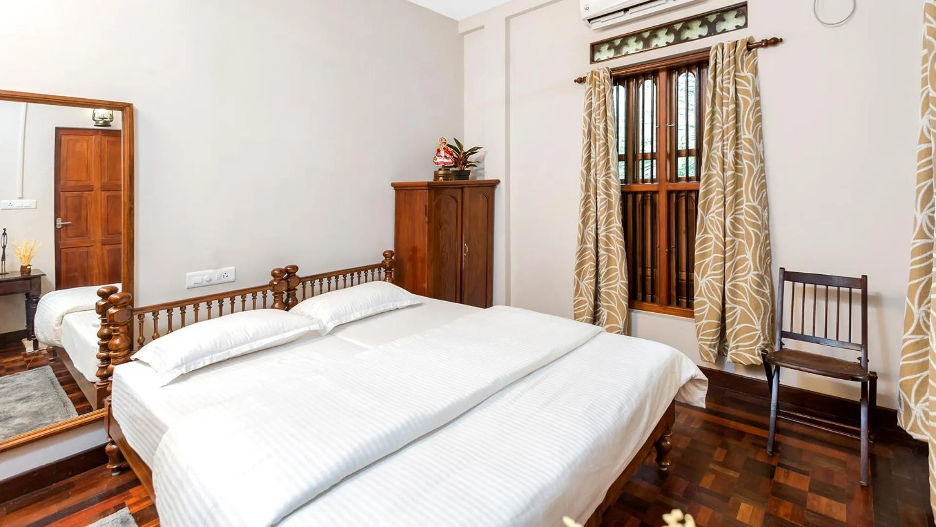 Bed in Kumarakom Wood Castle Serviced Appartments
