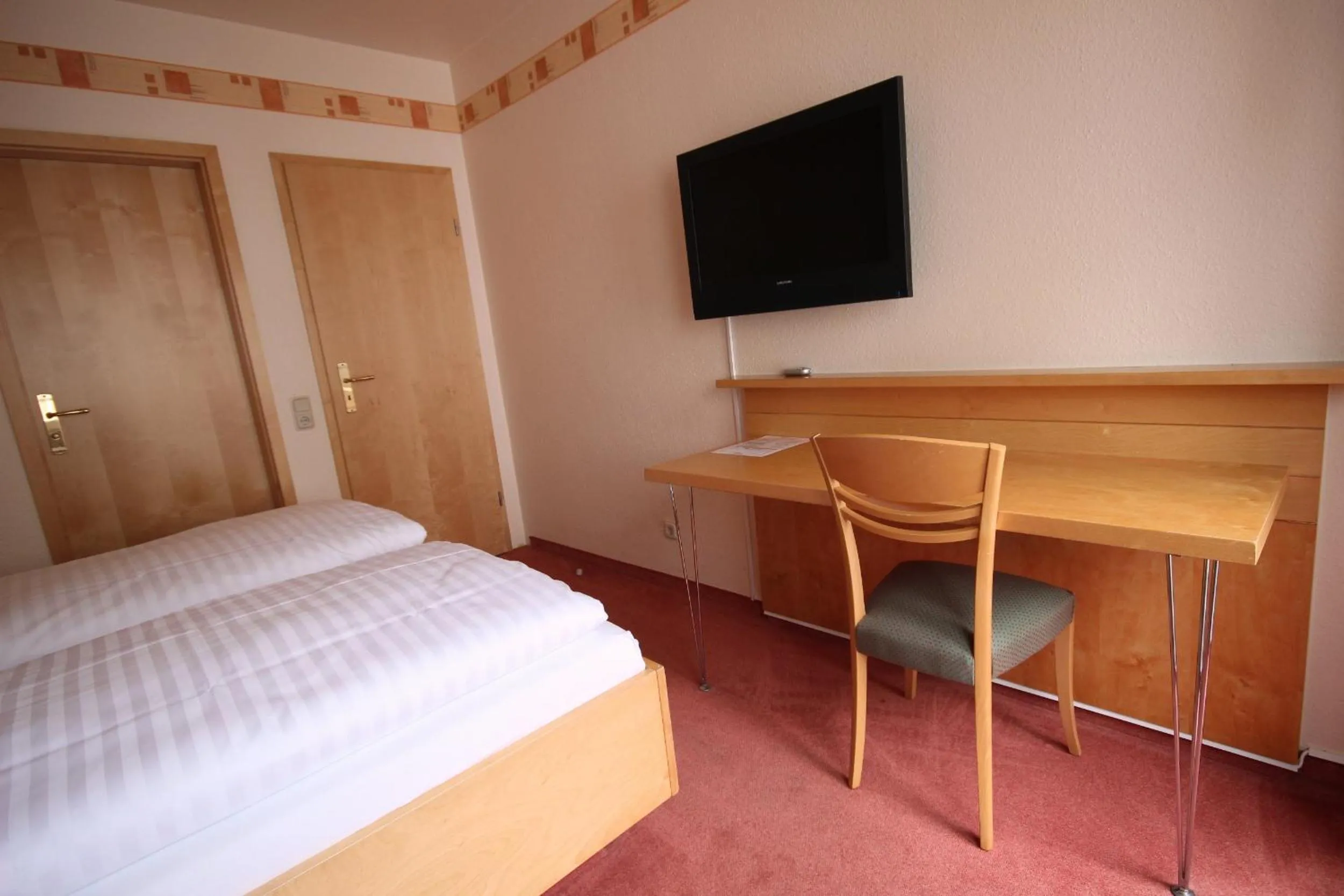 Photo of the whole room, Bed in Hotel Glockengasse