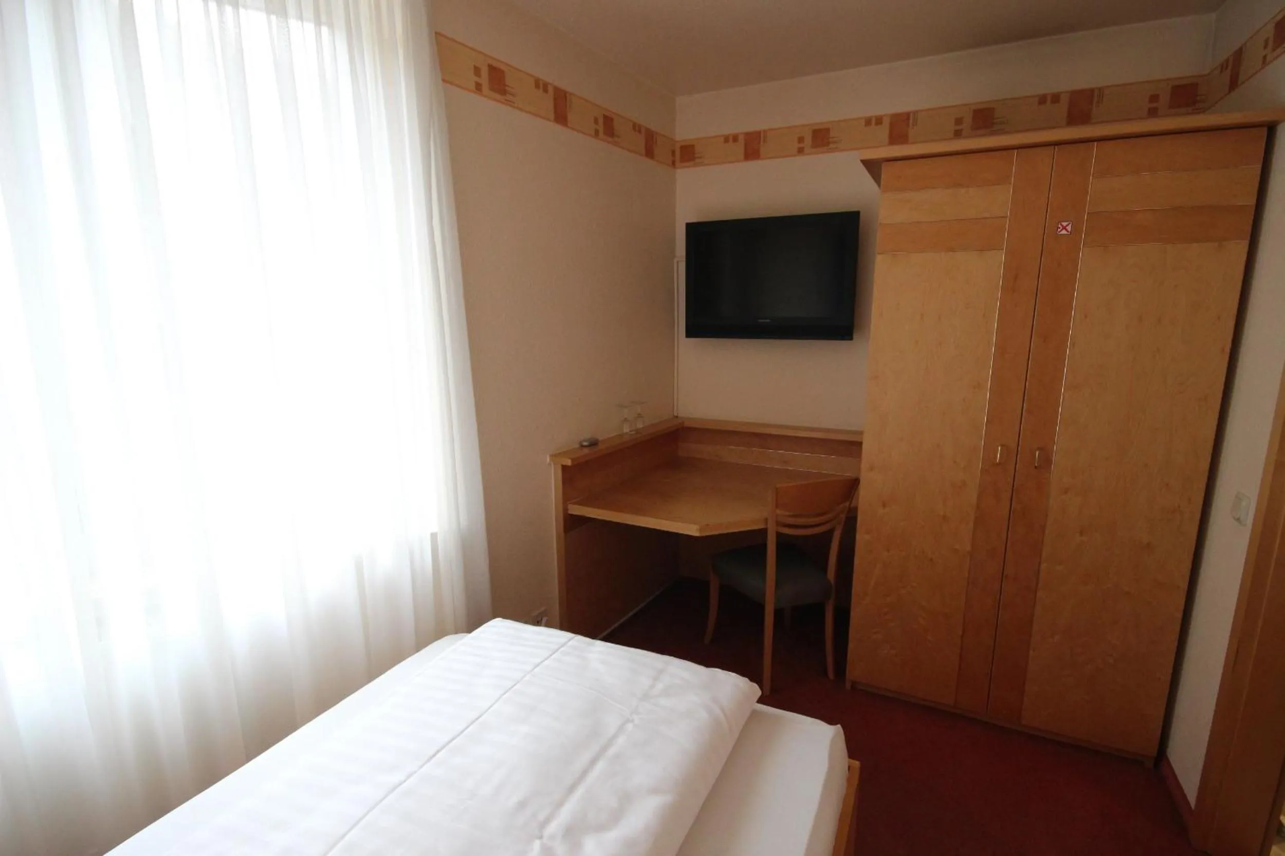 Photo of the whole room, Bed in Hotel Glockengasse