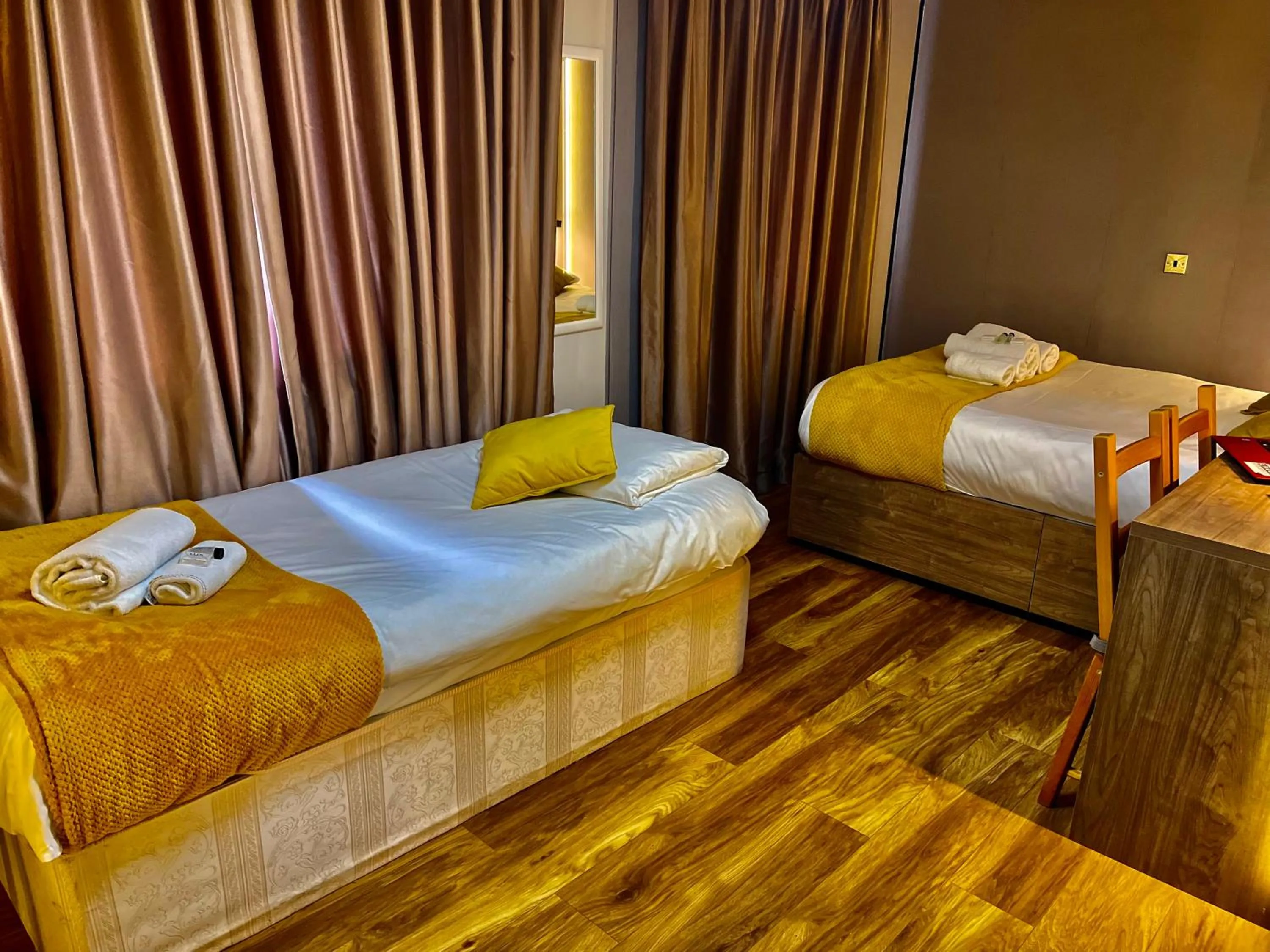 Bed in Hollybush Guest House