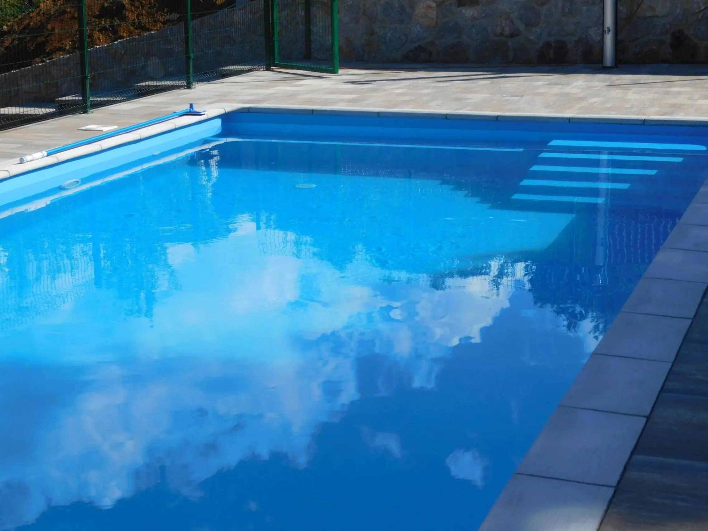 Swimming pool in Guesthouse Sara