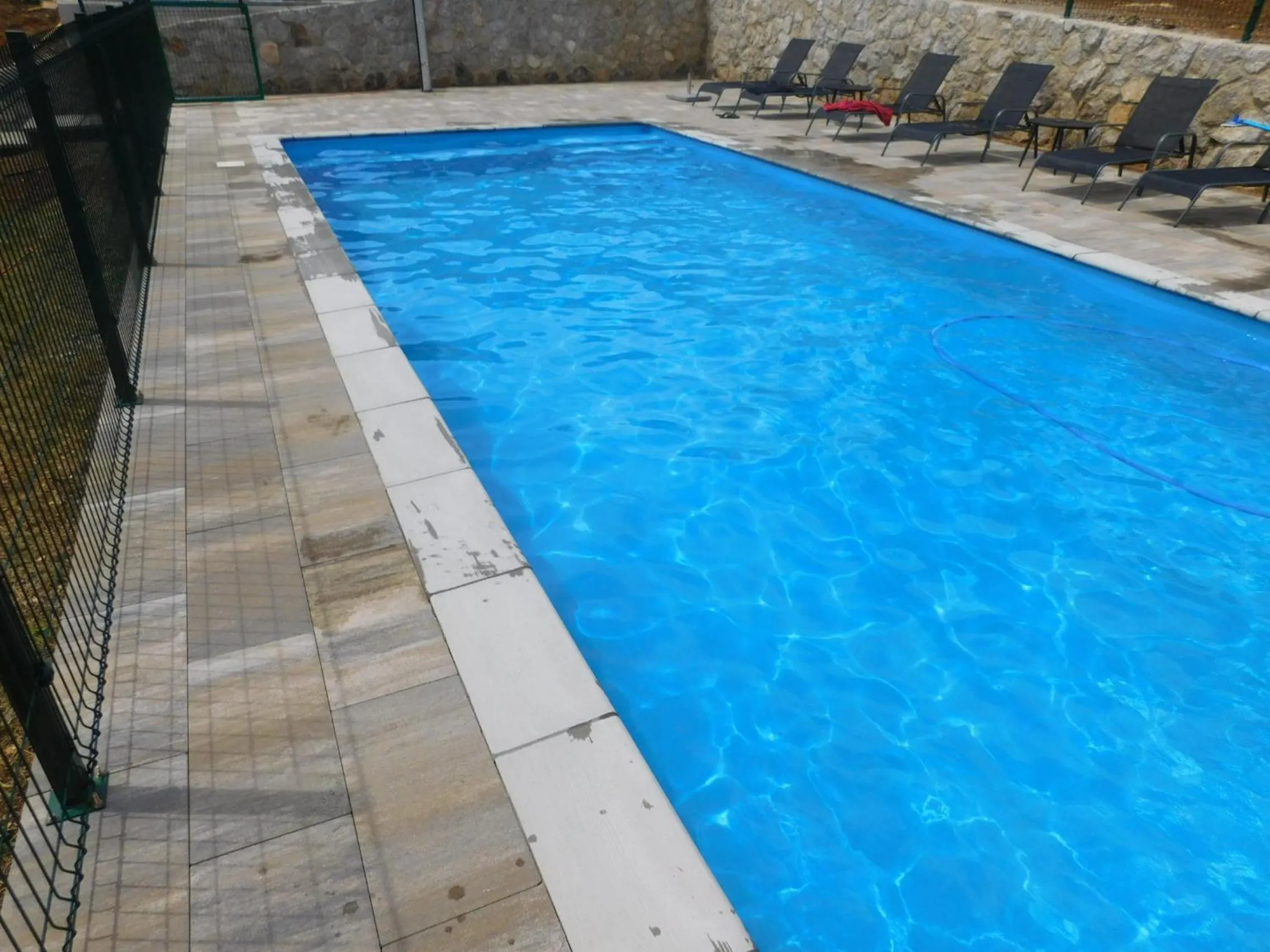 Swimming pool in Guesthouse Sara