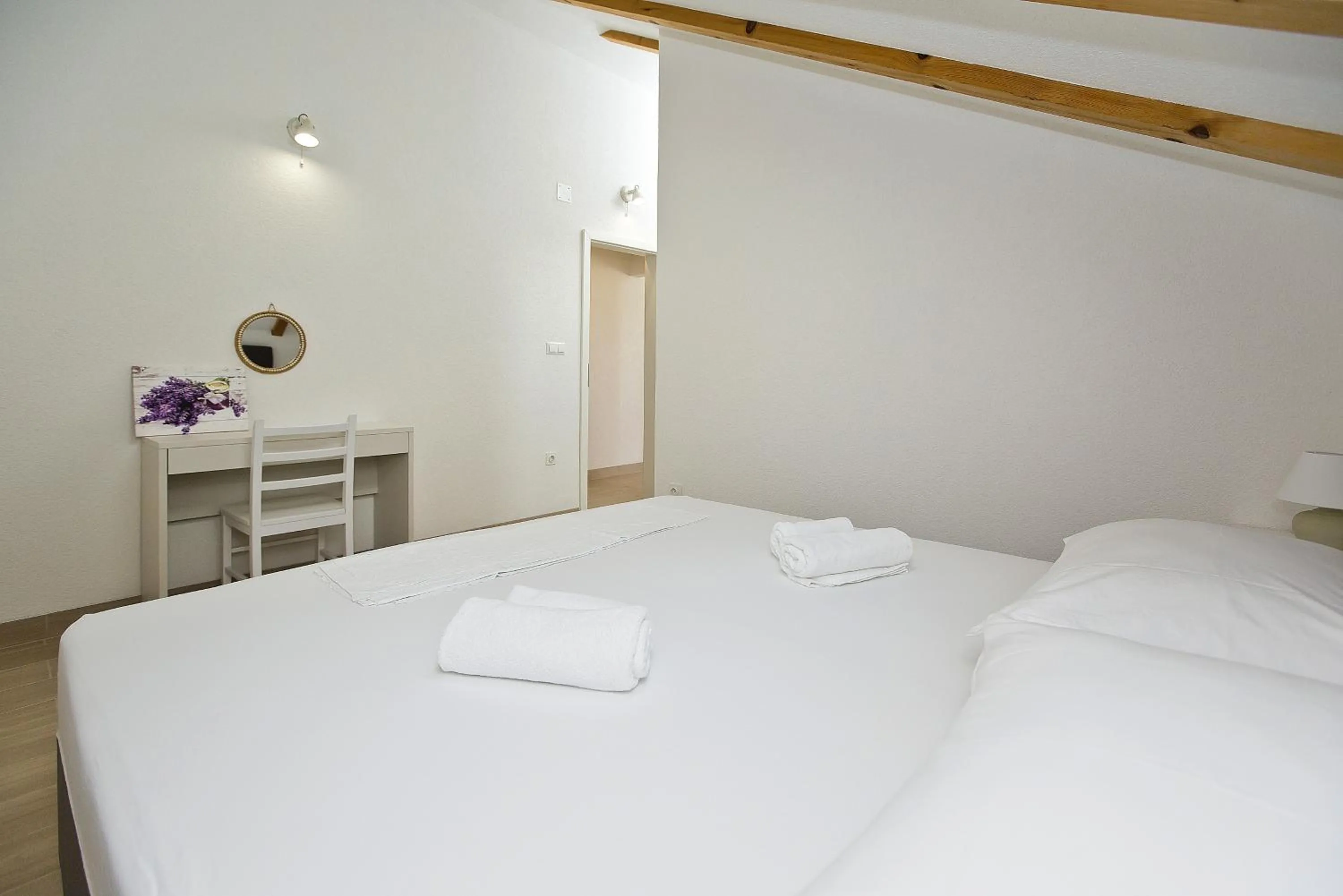 Bed in Apartments and Rooms Zvjezdana