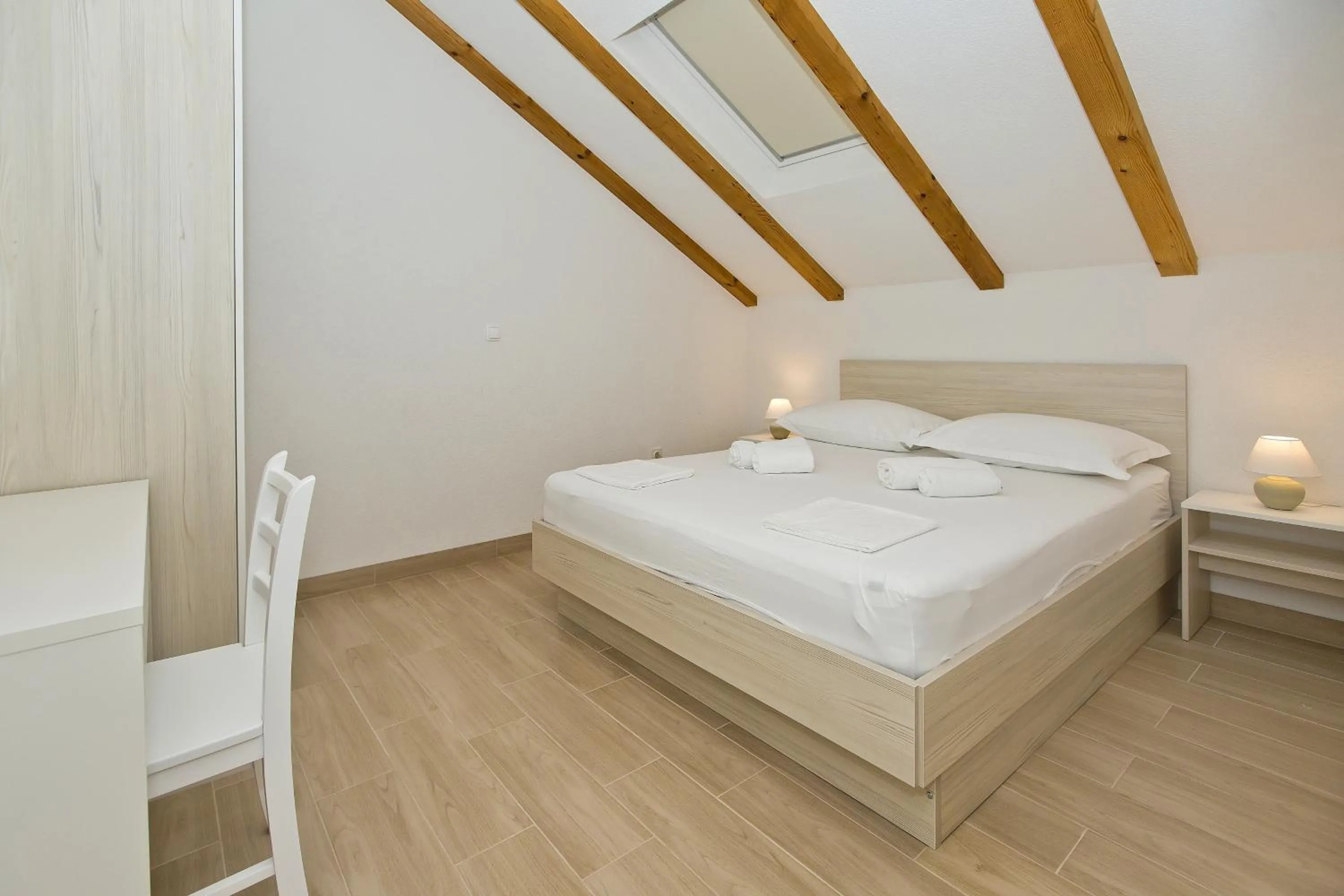 Bed in Apartments and Rooms Zvjezdana