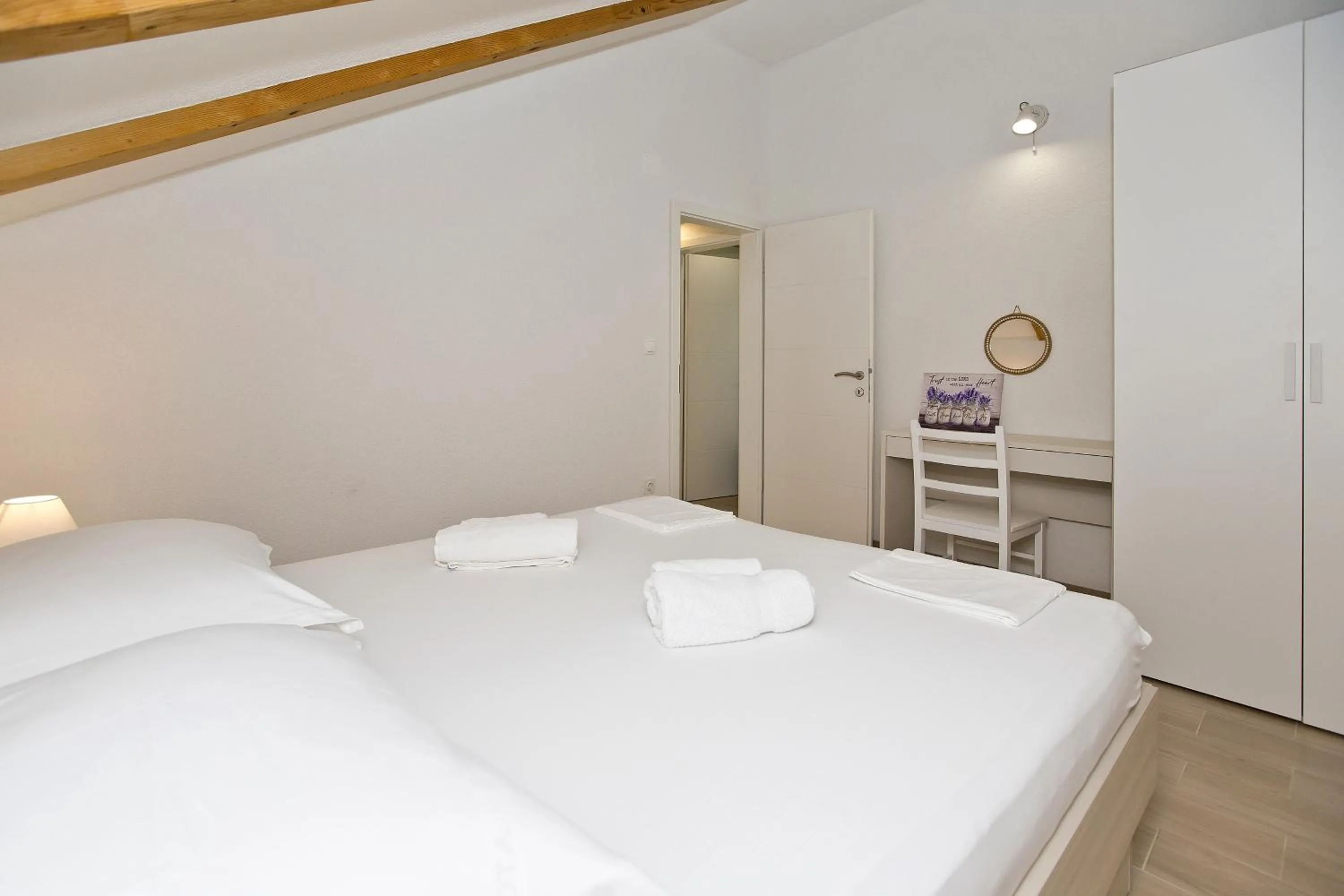 Bed in Apartments and Rooms Zvjezdana