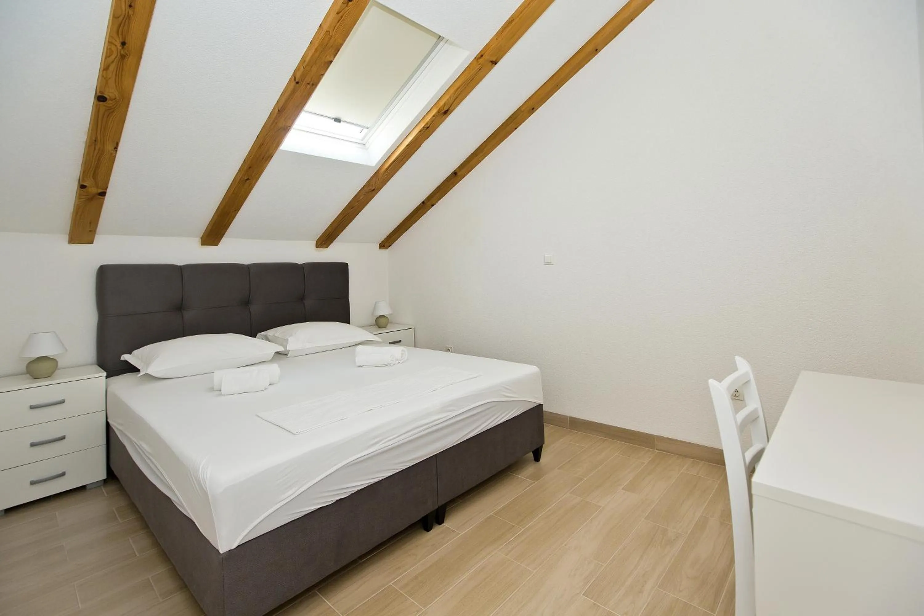 Bed in Apartments and Rooms Zvjezdana