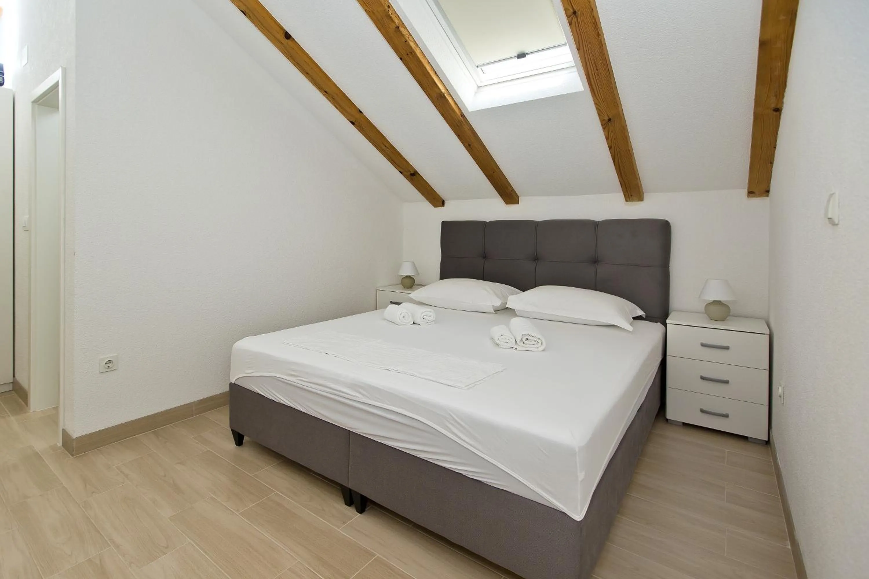 Bed in Apartments and Rooms Zvjezdana