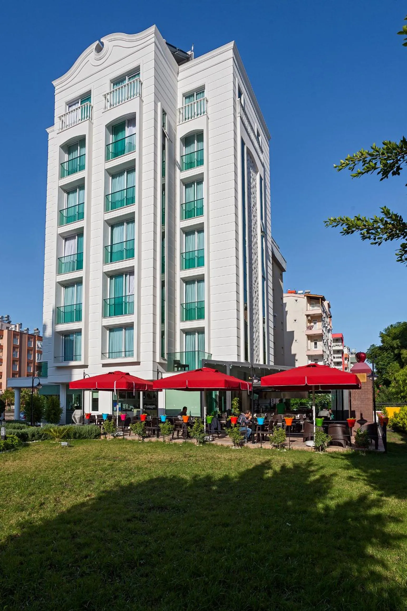 Property building in The Room Hotel & Apartments