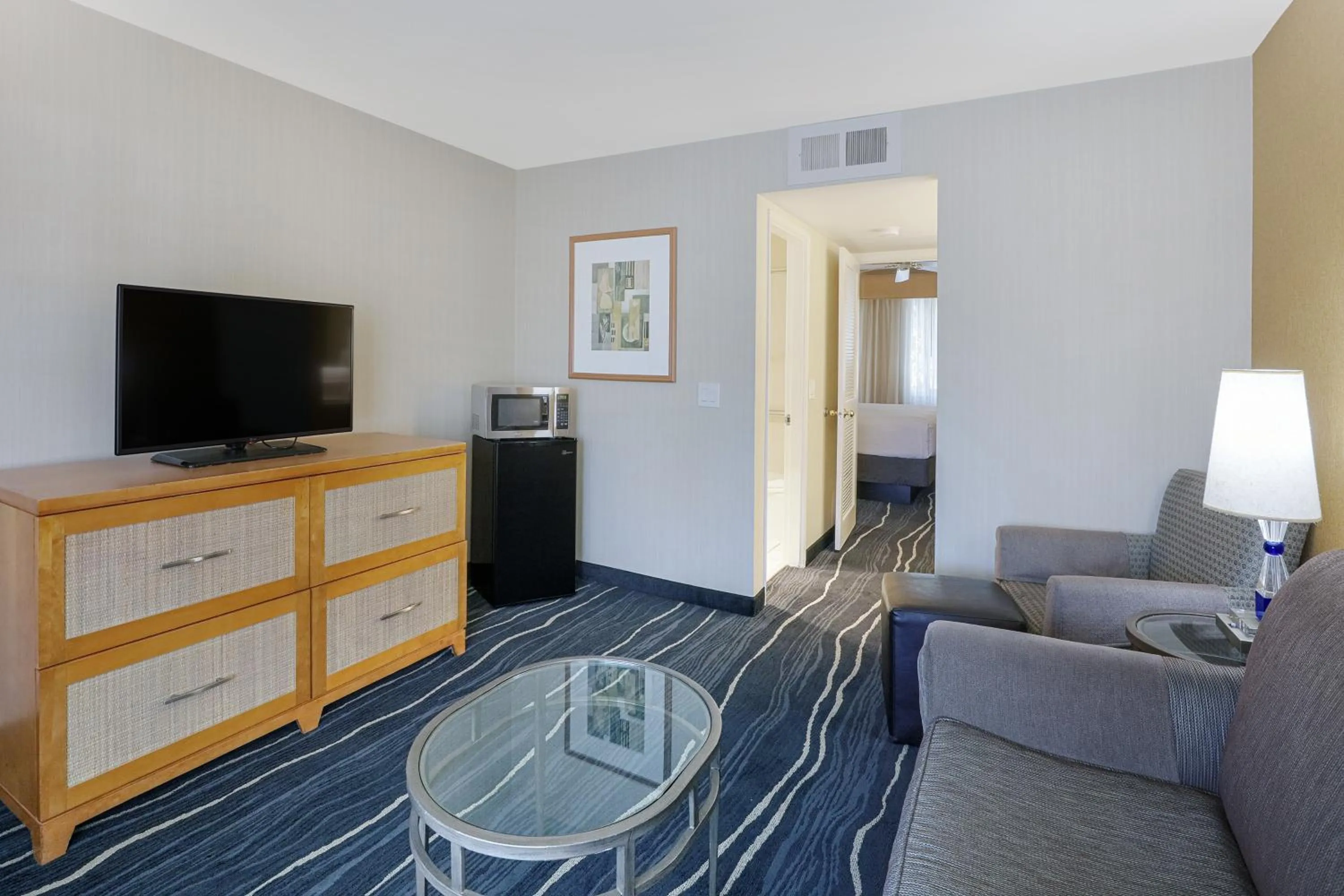 Living room in Ramada by Wyndham Costa Mesa/Newport Beach