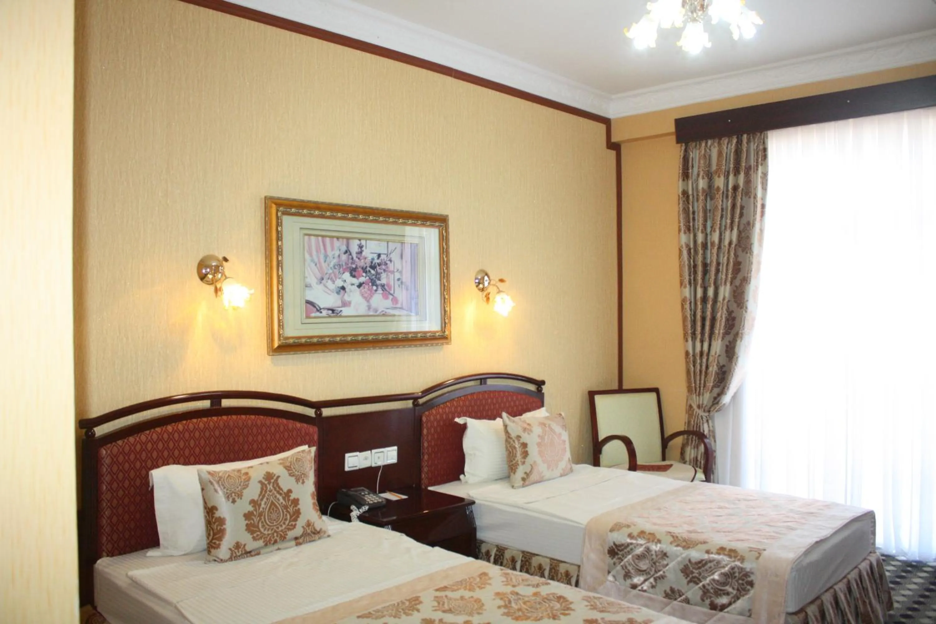 Bed in Hotel Asia Bukhara