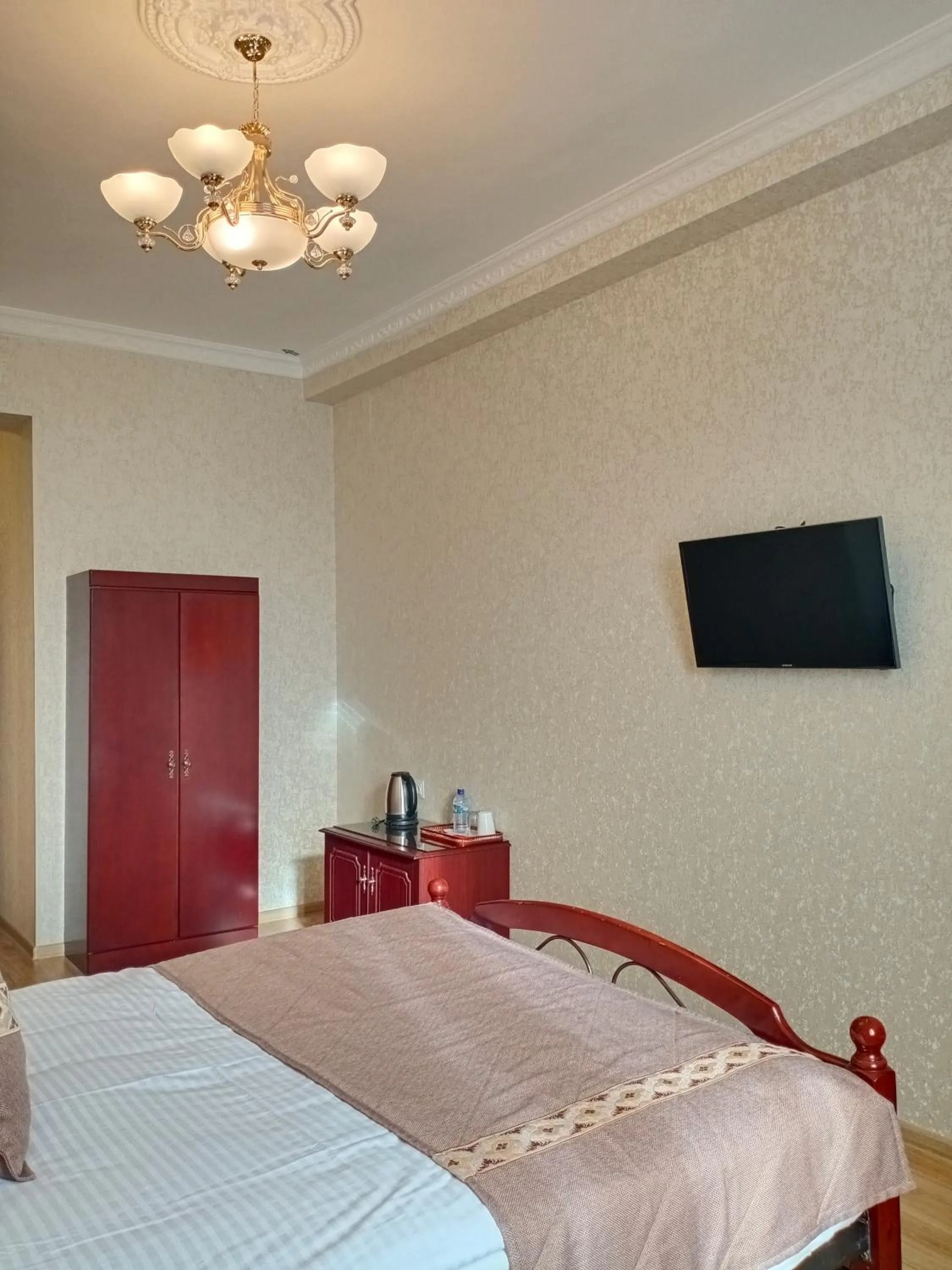 Bed in Hotel Asia Bukhara