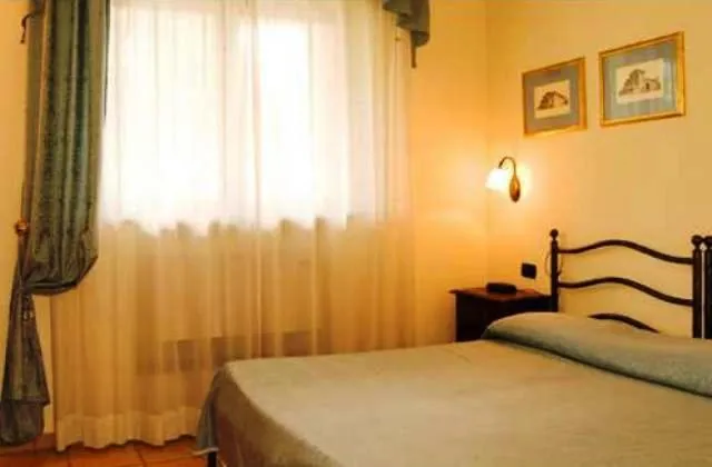 Bed in Dominus Hotel