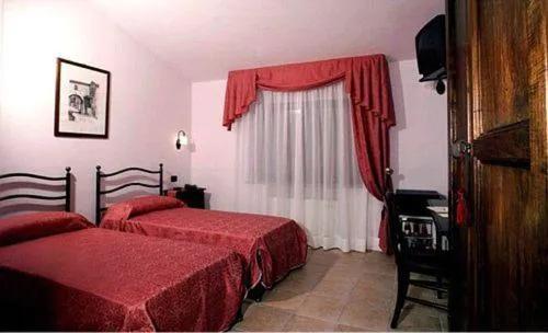 Bed in Dominus Hotel