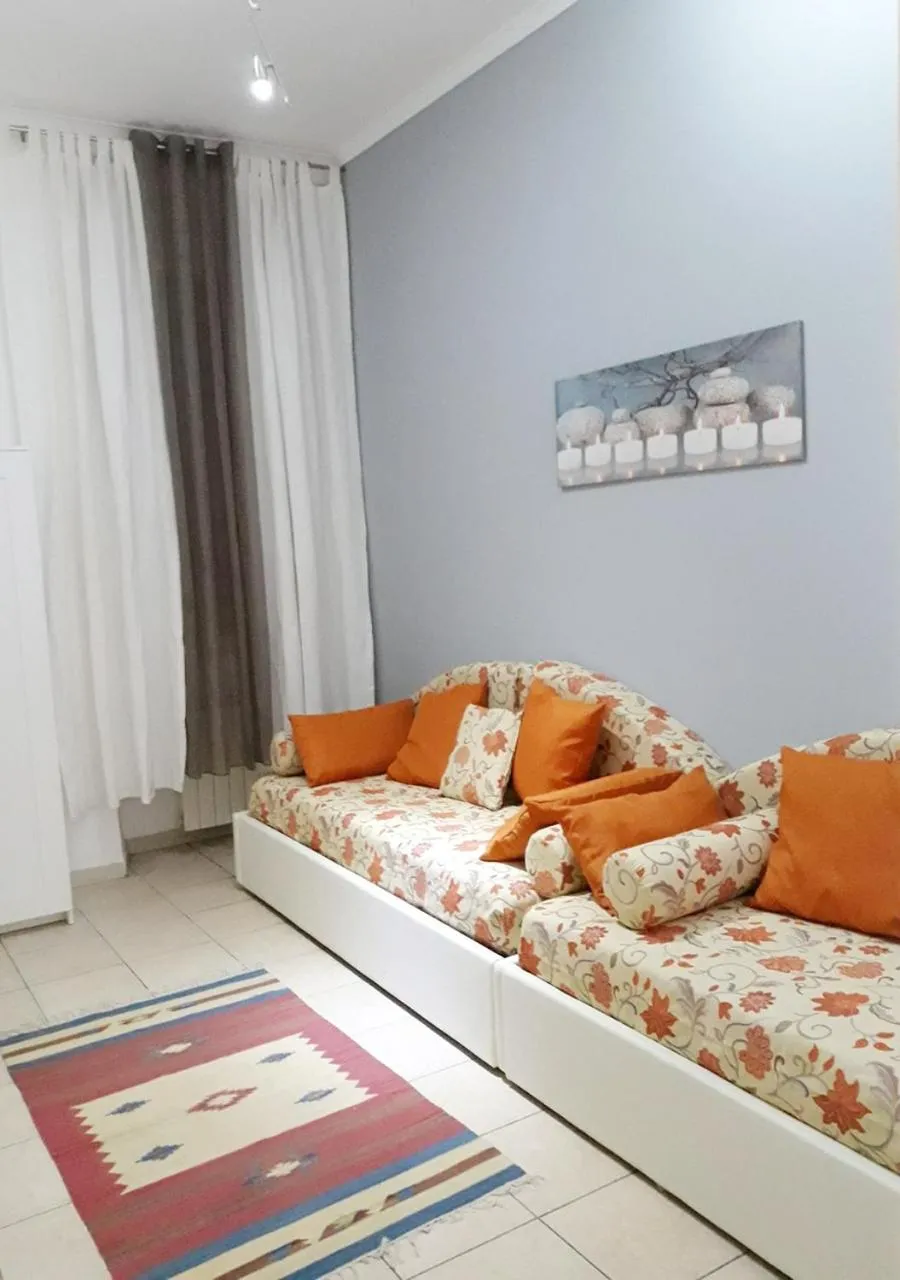 Seating area, Bed in Il sole del Vaticano