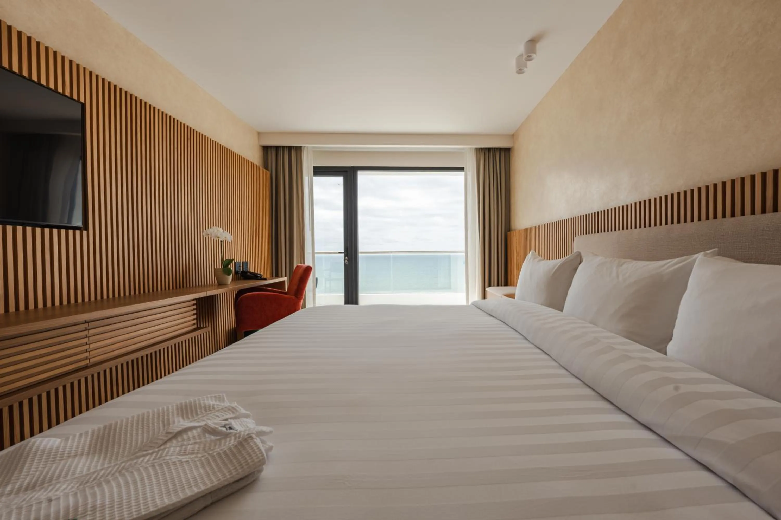 Bed in MantaHost Hotel