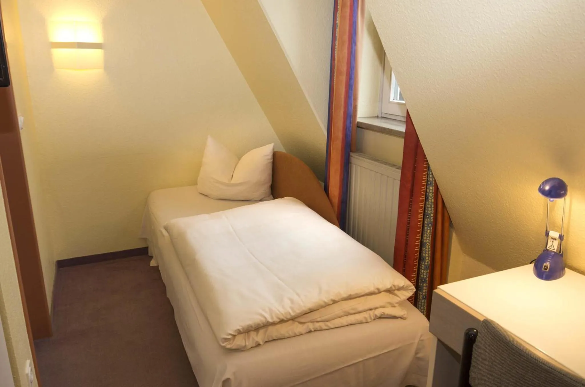 Bed in Hotel Restaurant Lohmühle