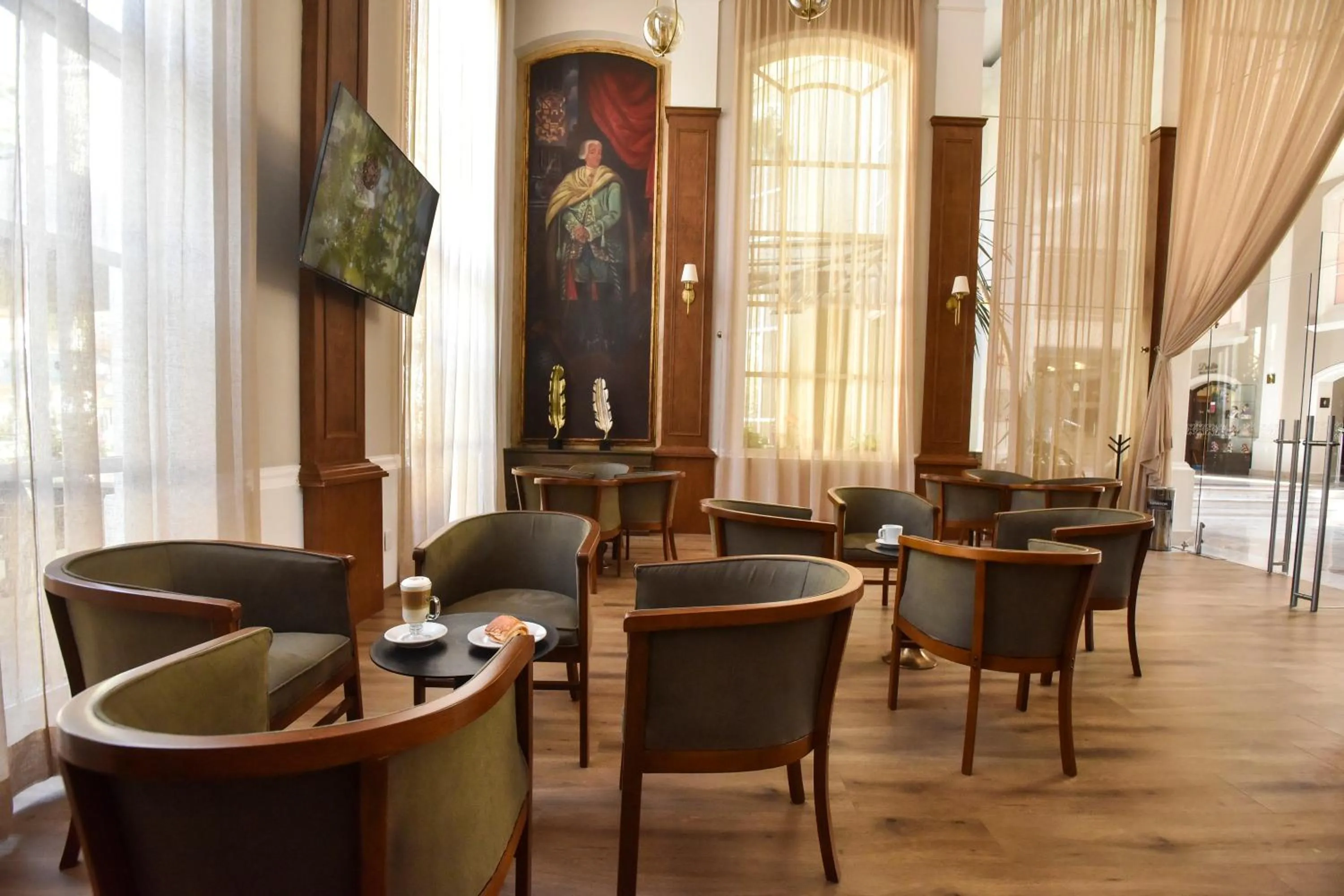 Lounge or bar in Plaza Camelinas Hotel