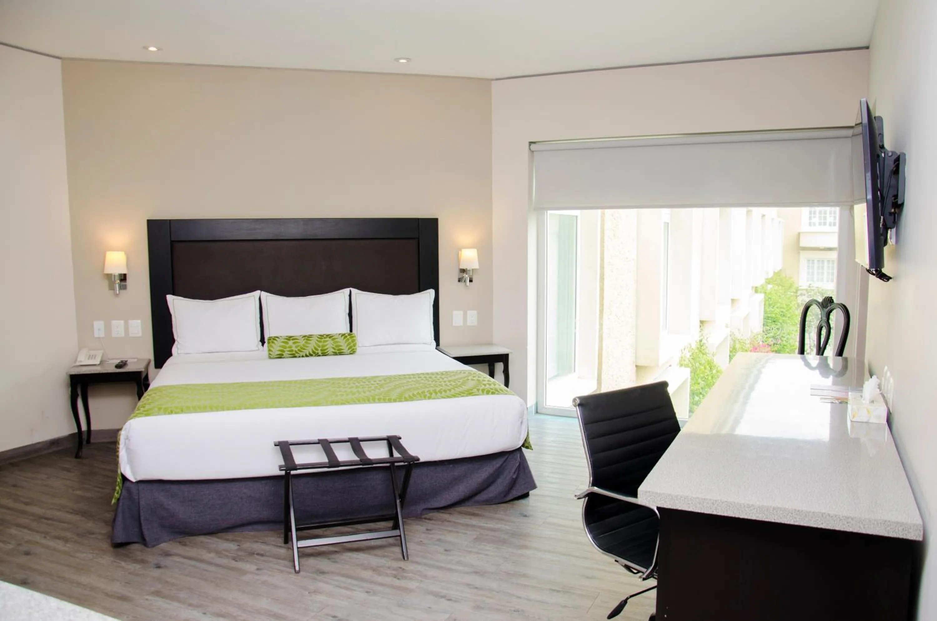 Bed in Plaza Camelinas Hotel