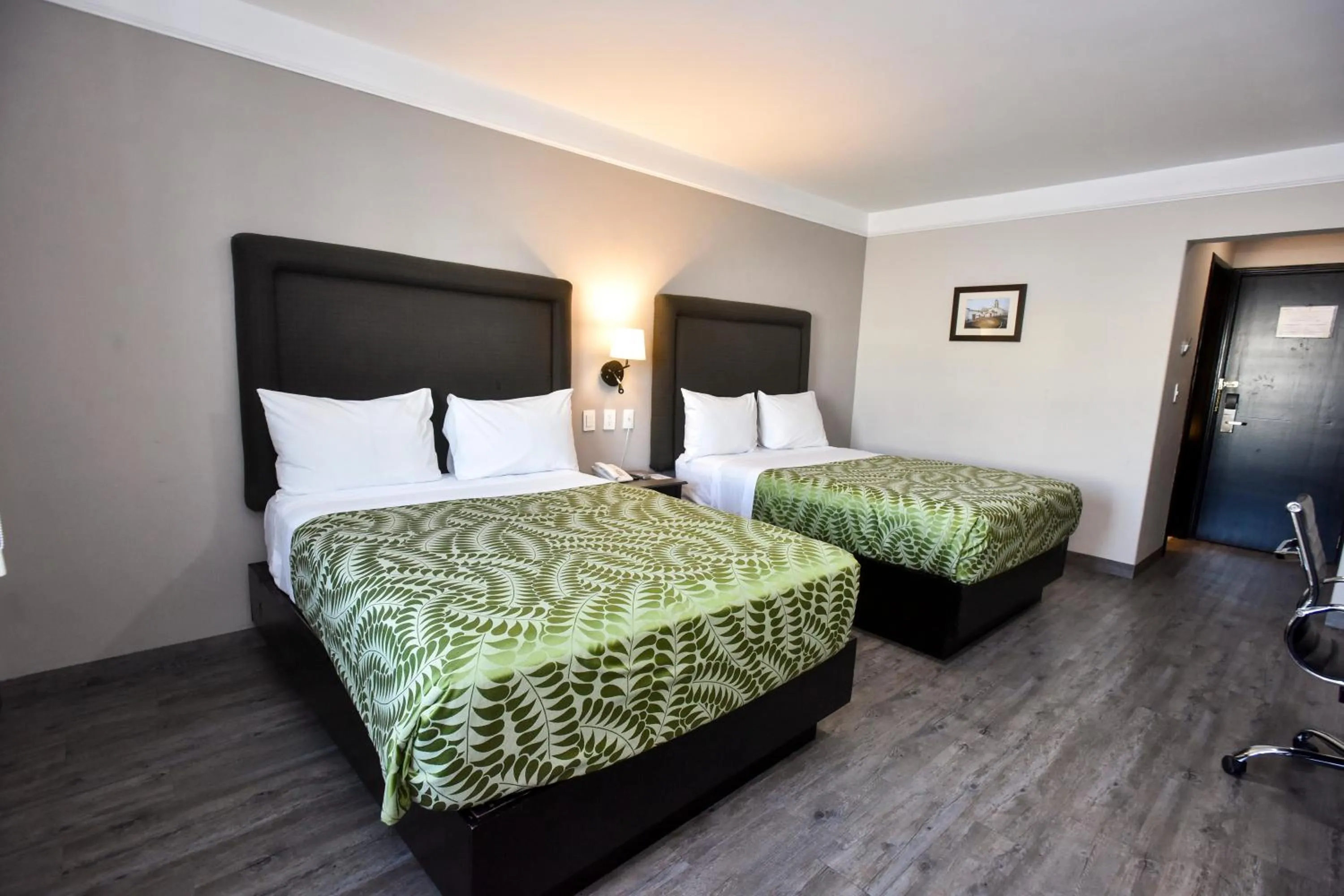 Bed in Plaza Camelinas Hotel