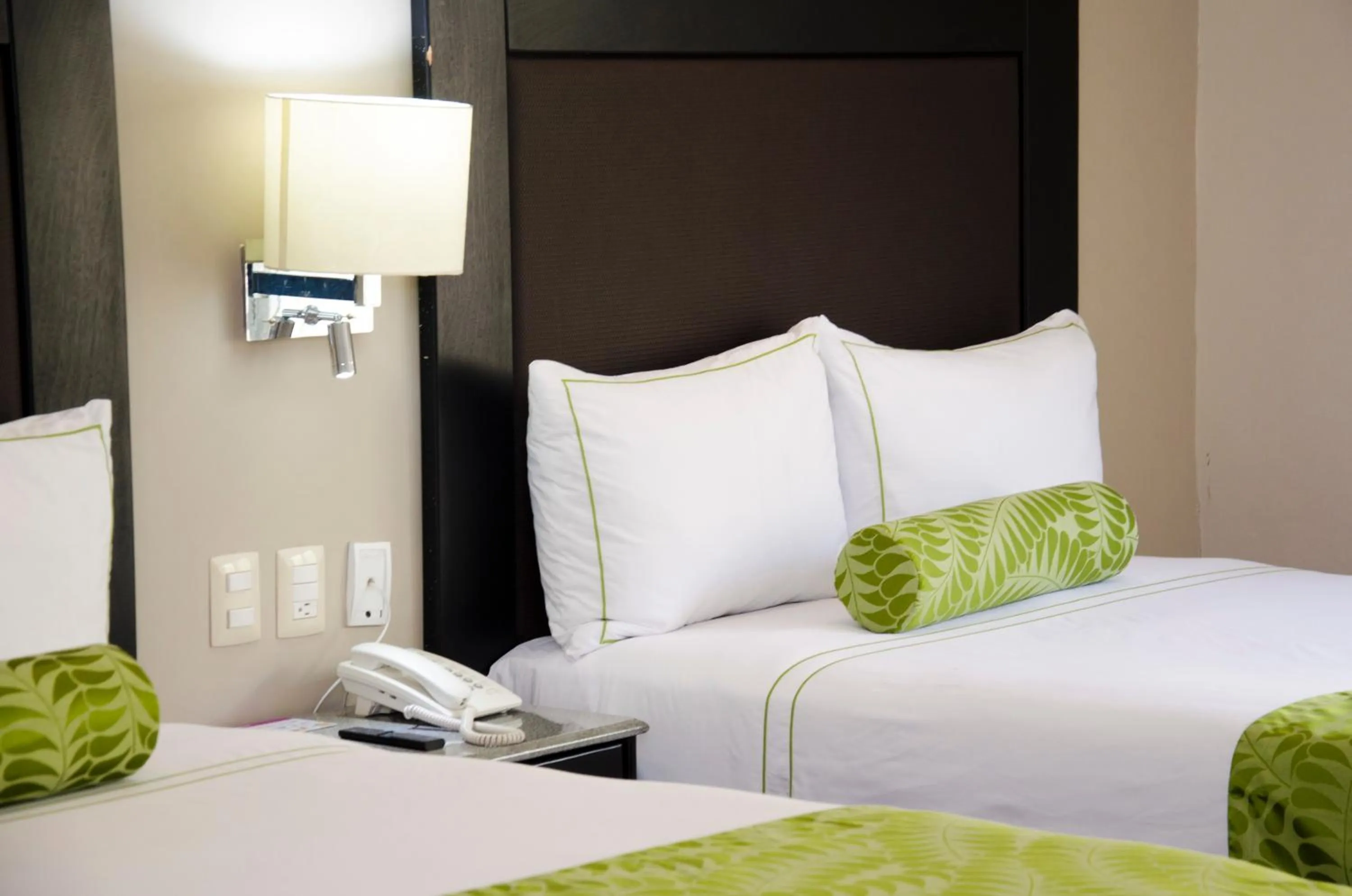 Bed in Plaza Camelinas Hotel