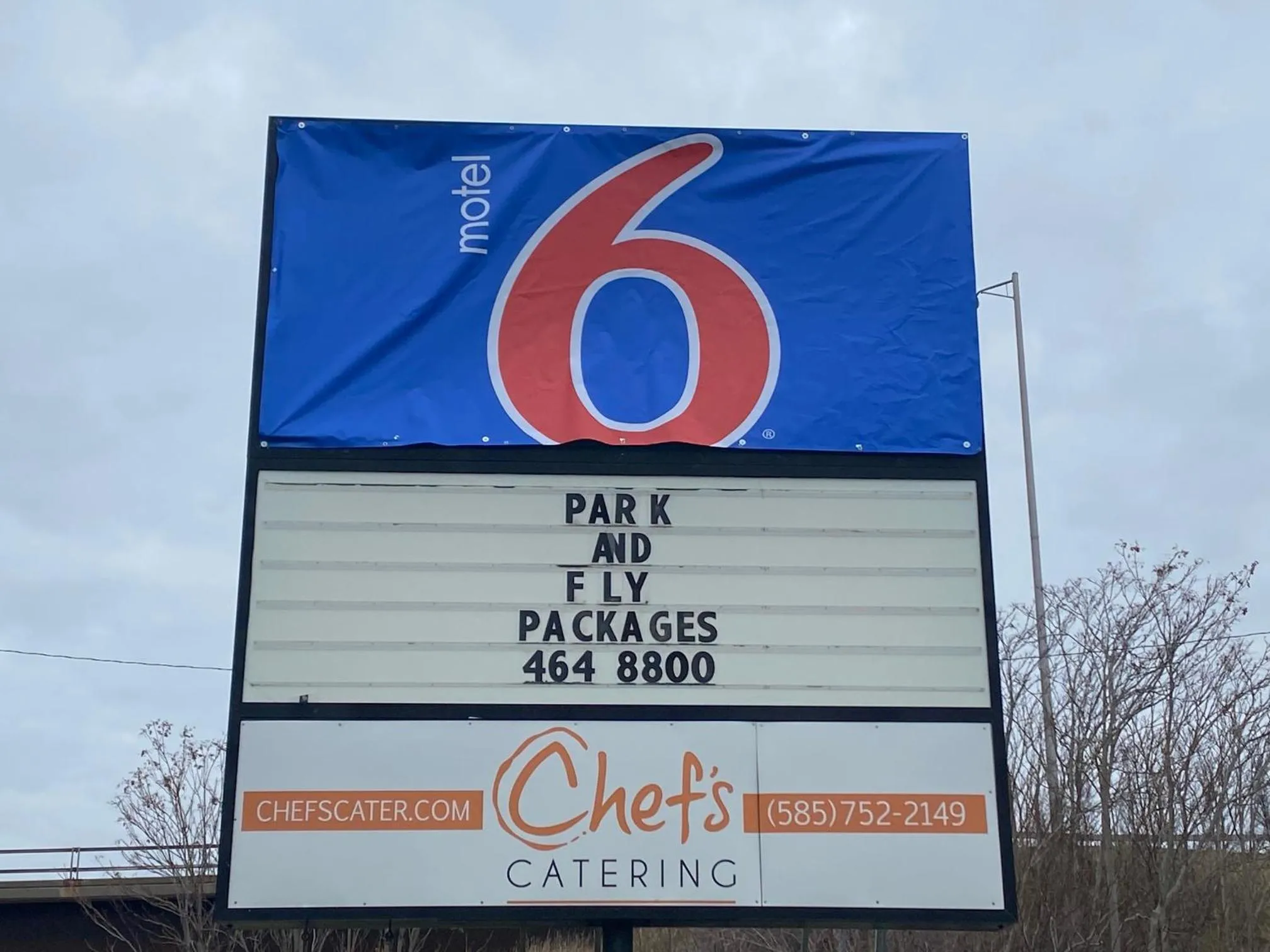Logo/Certificate/Sign in Motel 6 Rochester, NY - Airport