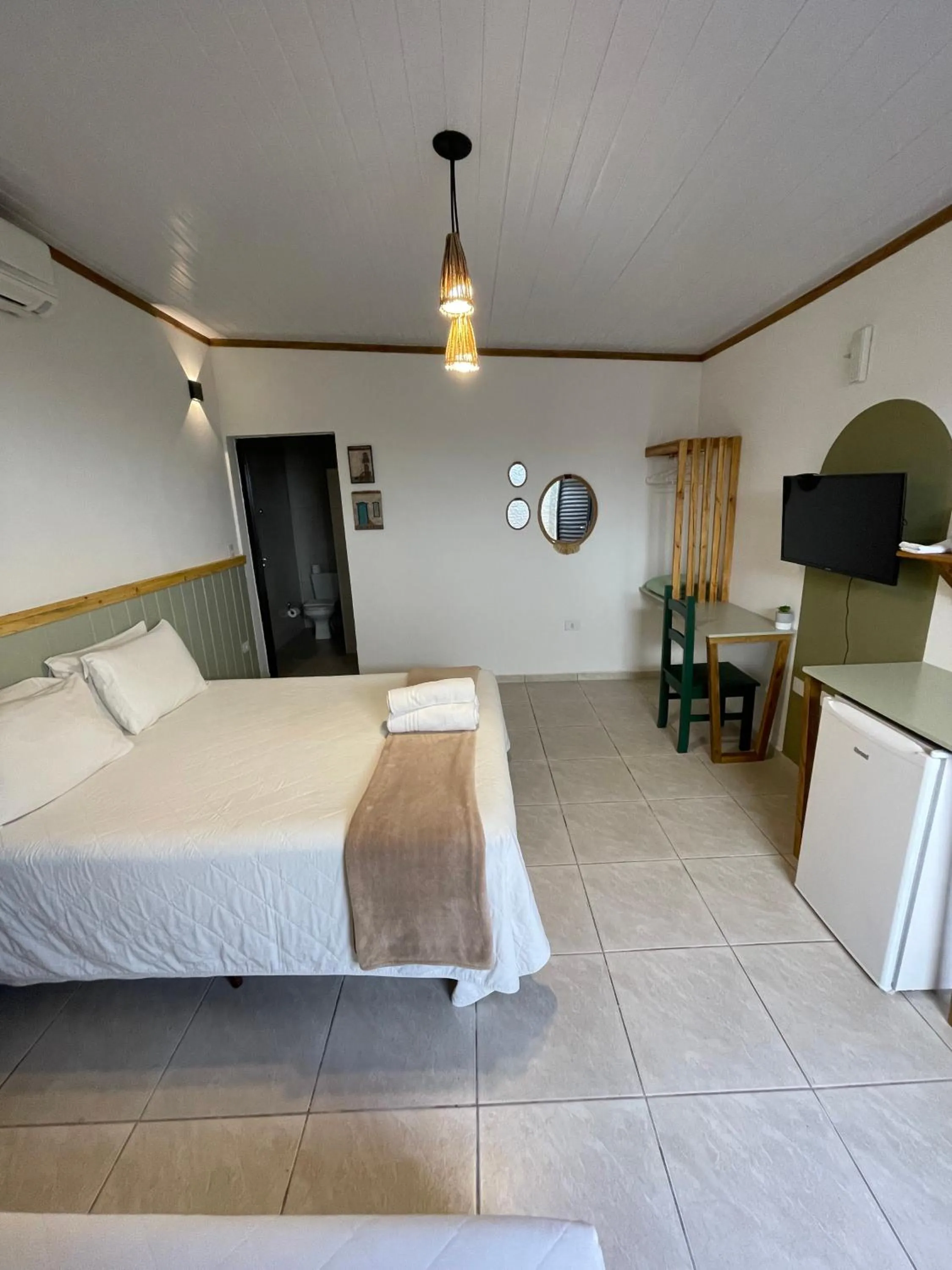 Bed in Pousada Ilha da Magia