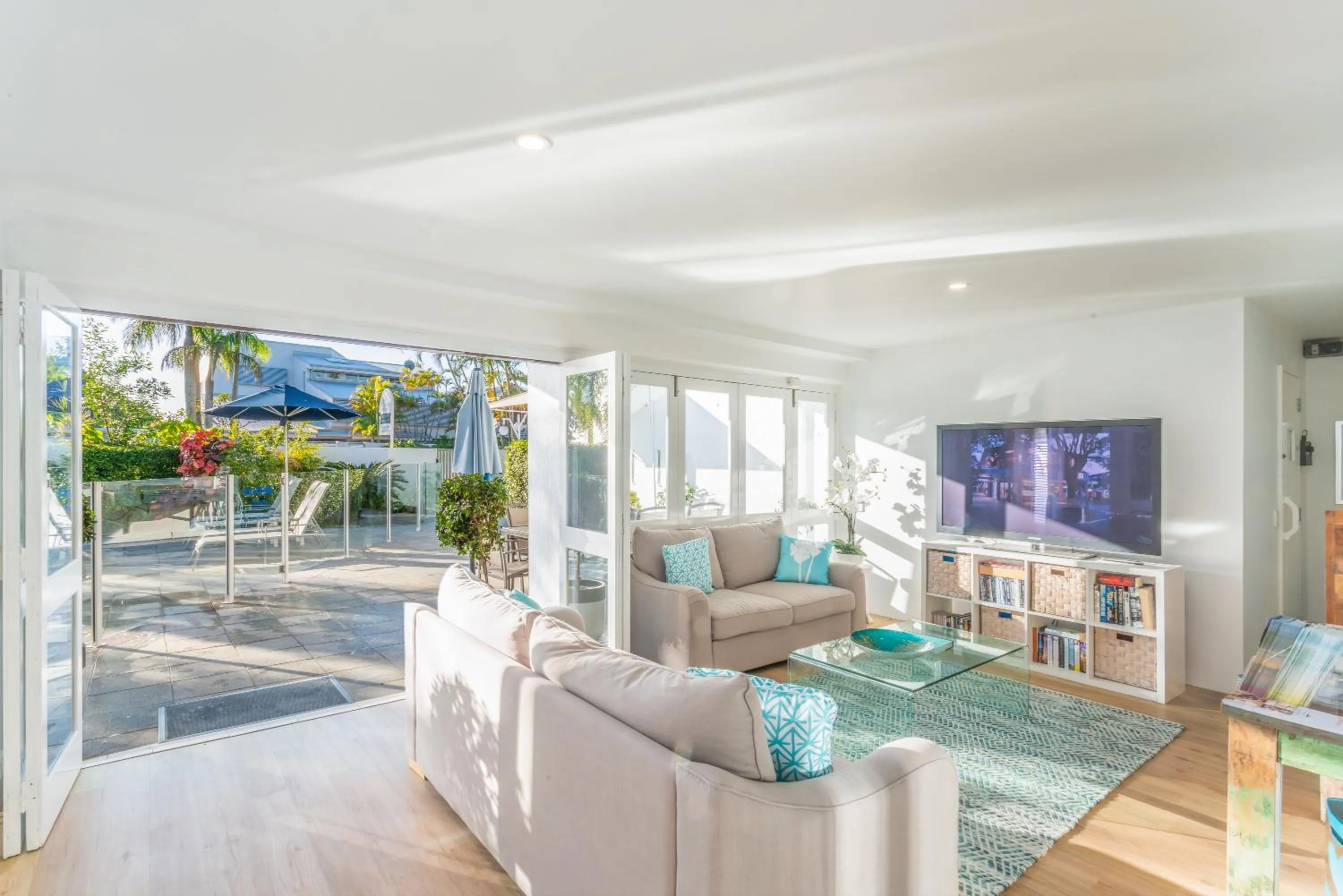 Communal lounge/ TV room in Noosa Boutique Apartments & Elkhorn Villas