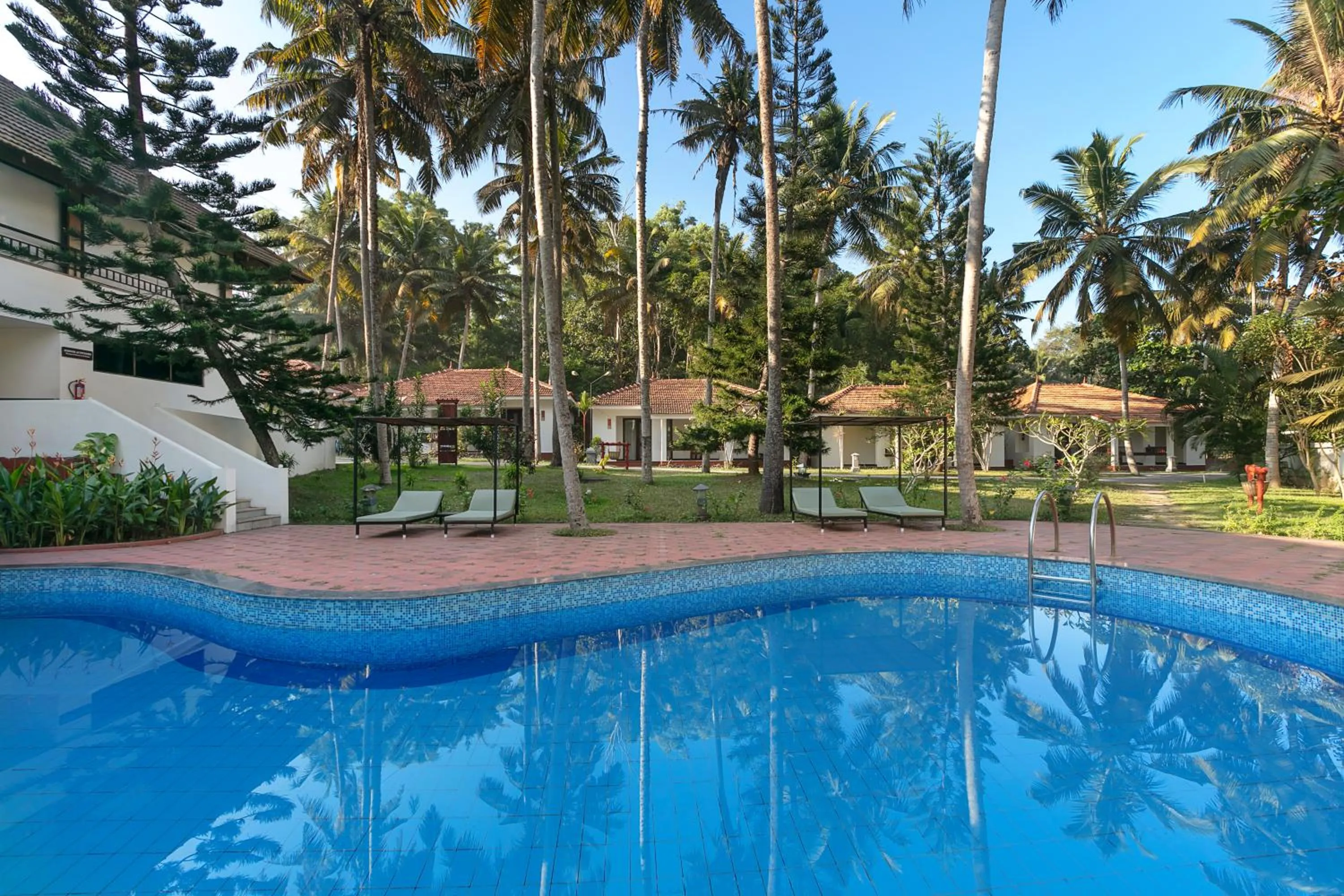Swimming pool in Estuary Sarovar Premiere Poovar Island