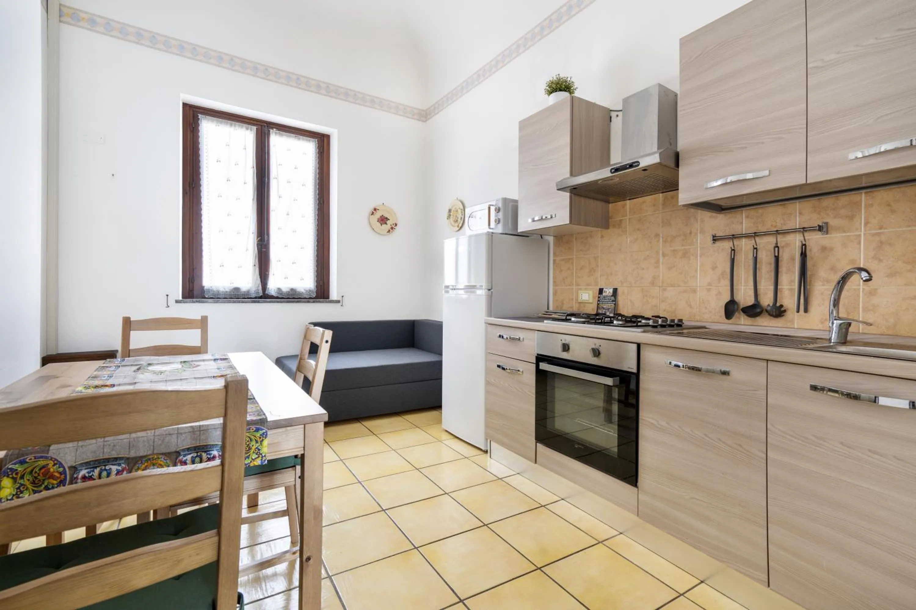 Kitchen or kitchenette in Porta Carini Residence
