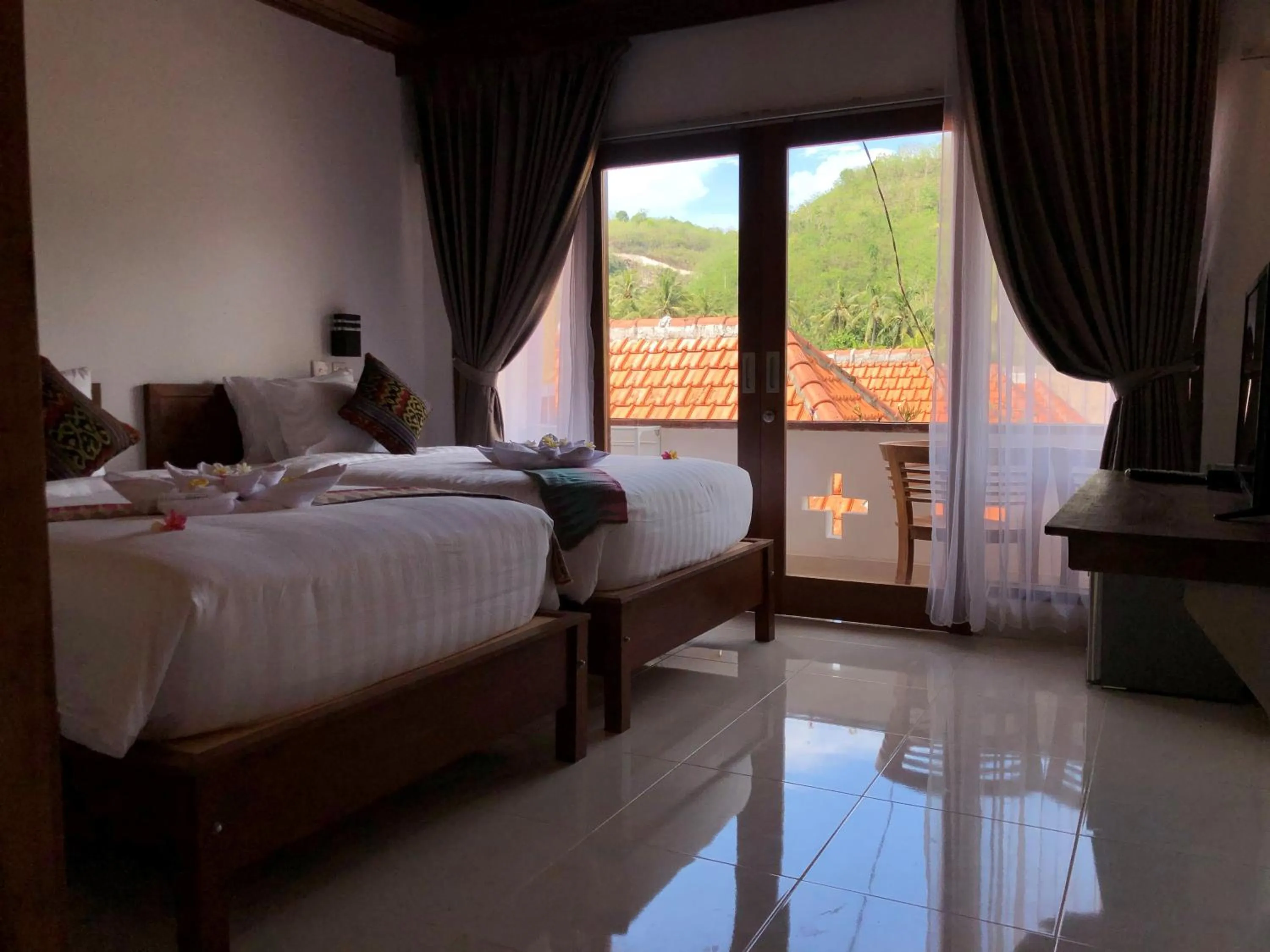 Bed in Crystal Bay Bungalows