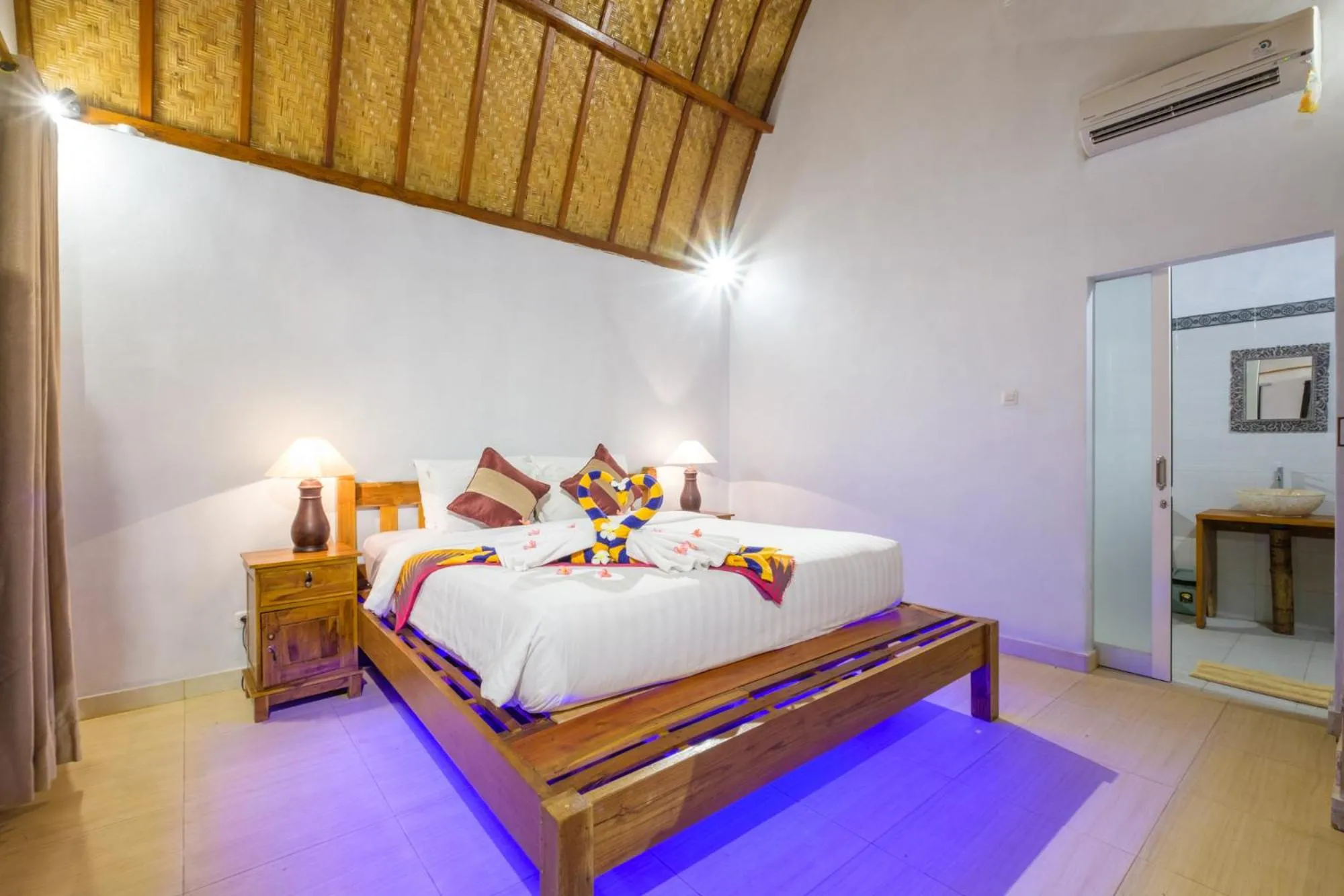 Bed in Crystal Bay Bungalows