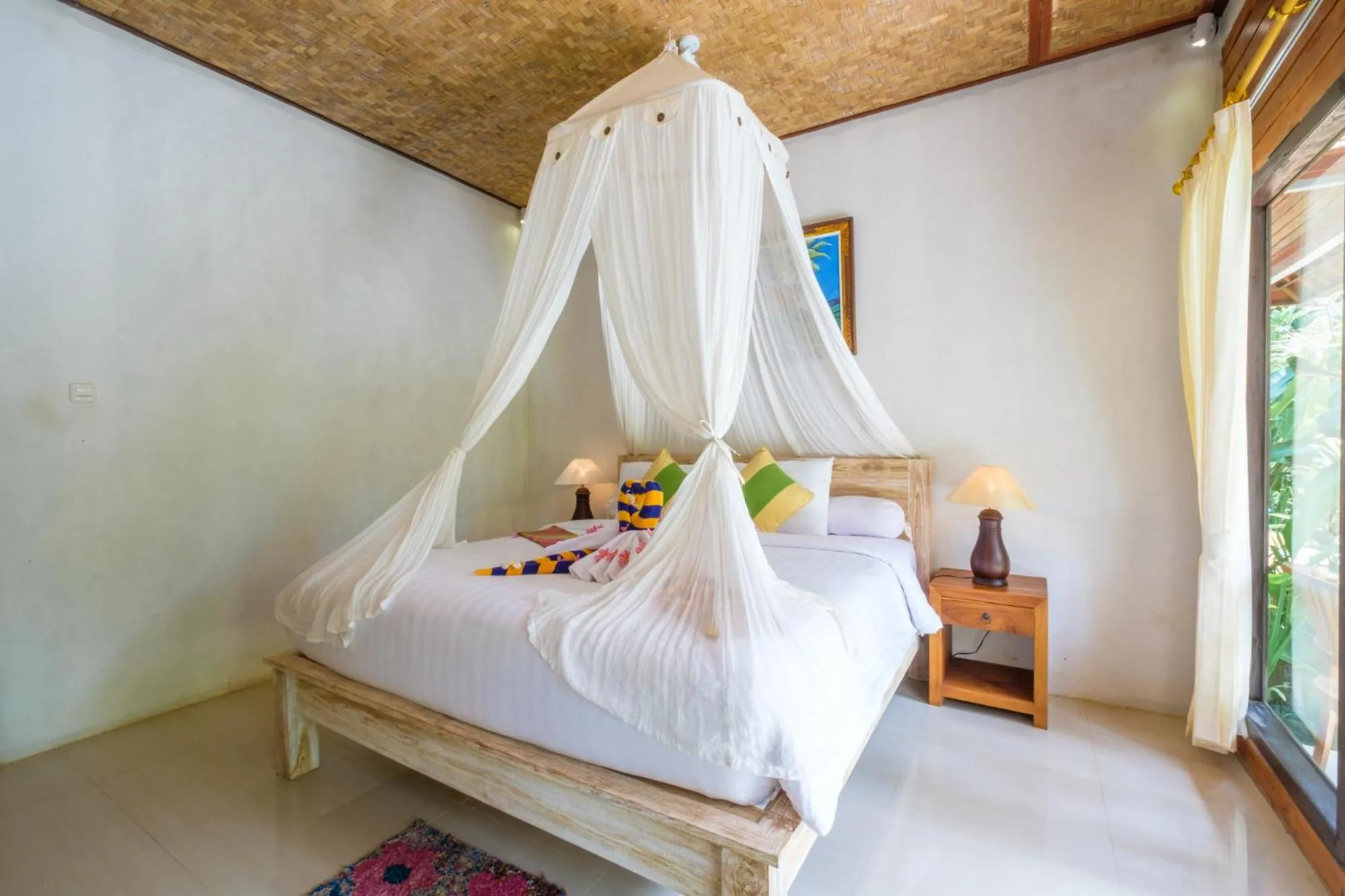 Bed in Crystal Bay Bungalows