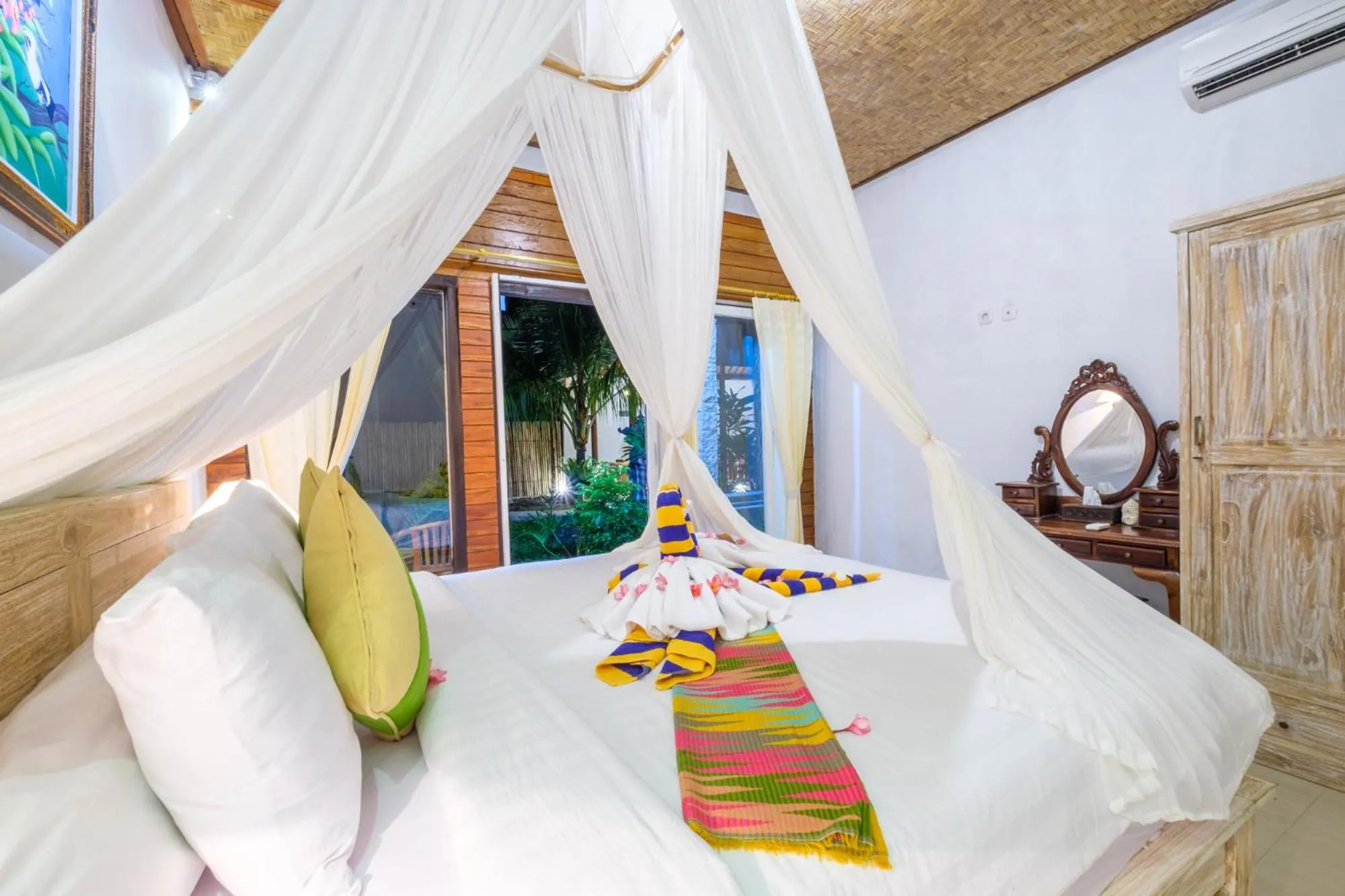 Bed in Crystal Bay Bungalows