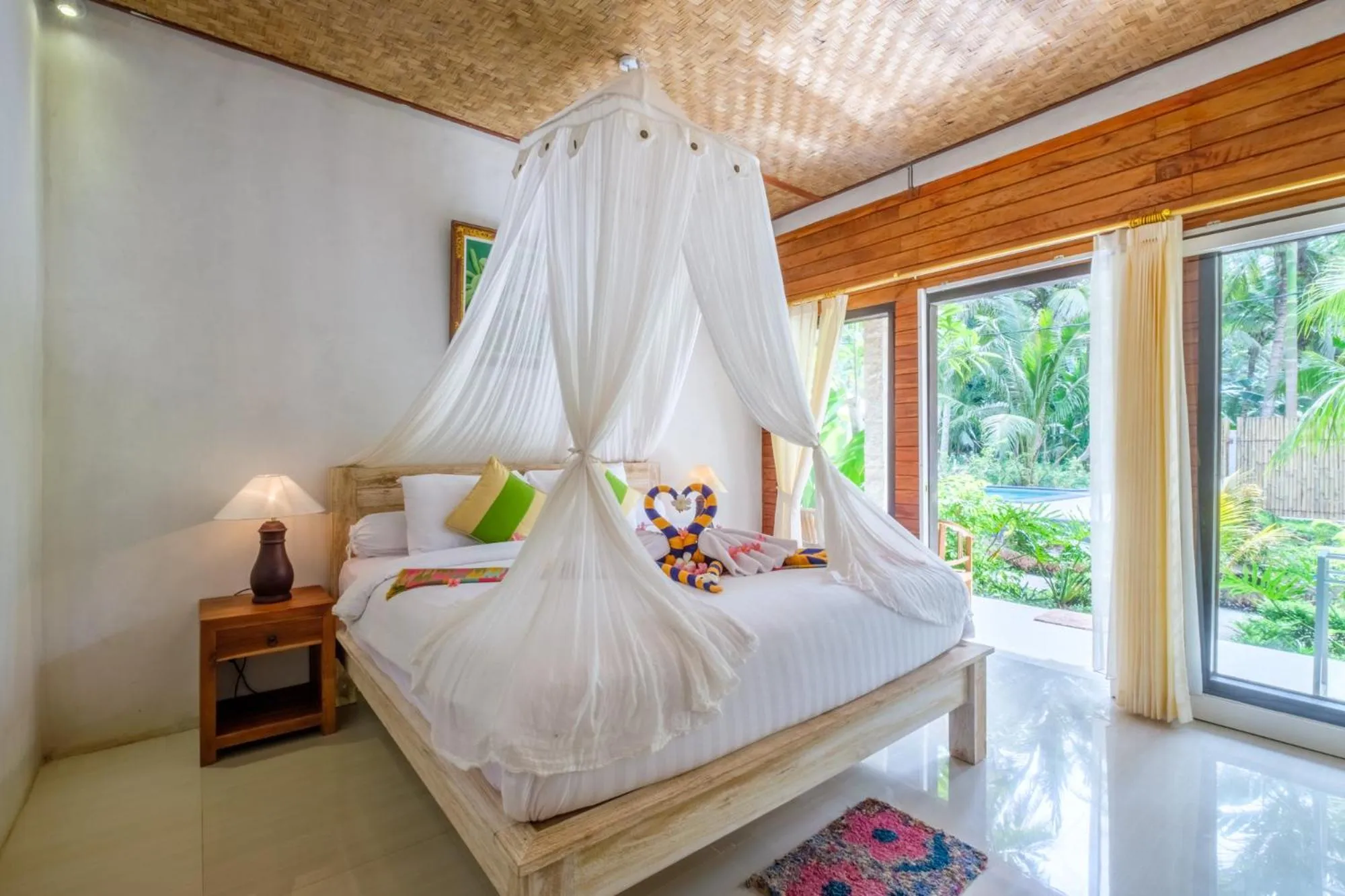 Bed in Crystal Bay Bungalows