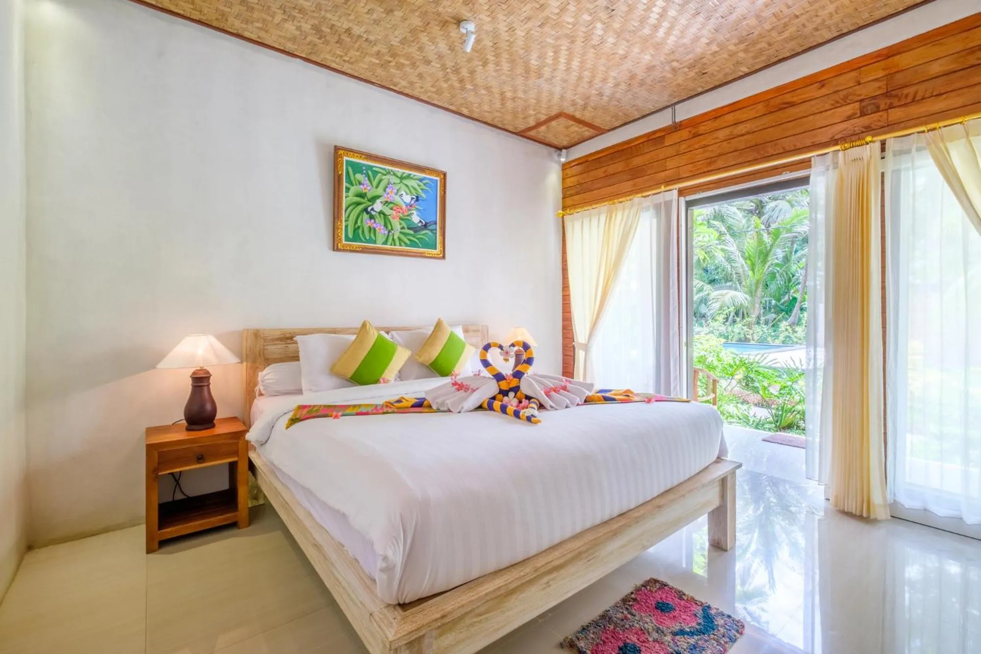 Bed in Crystal Bay Bungalows