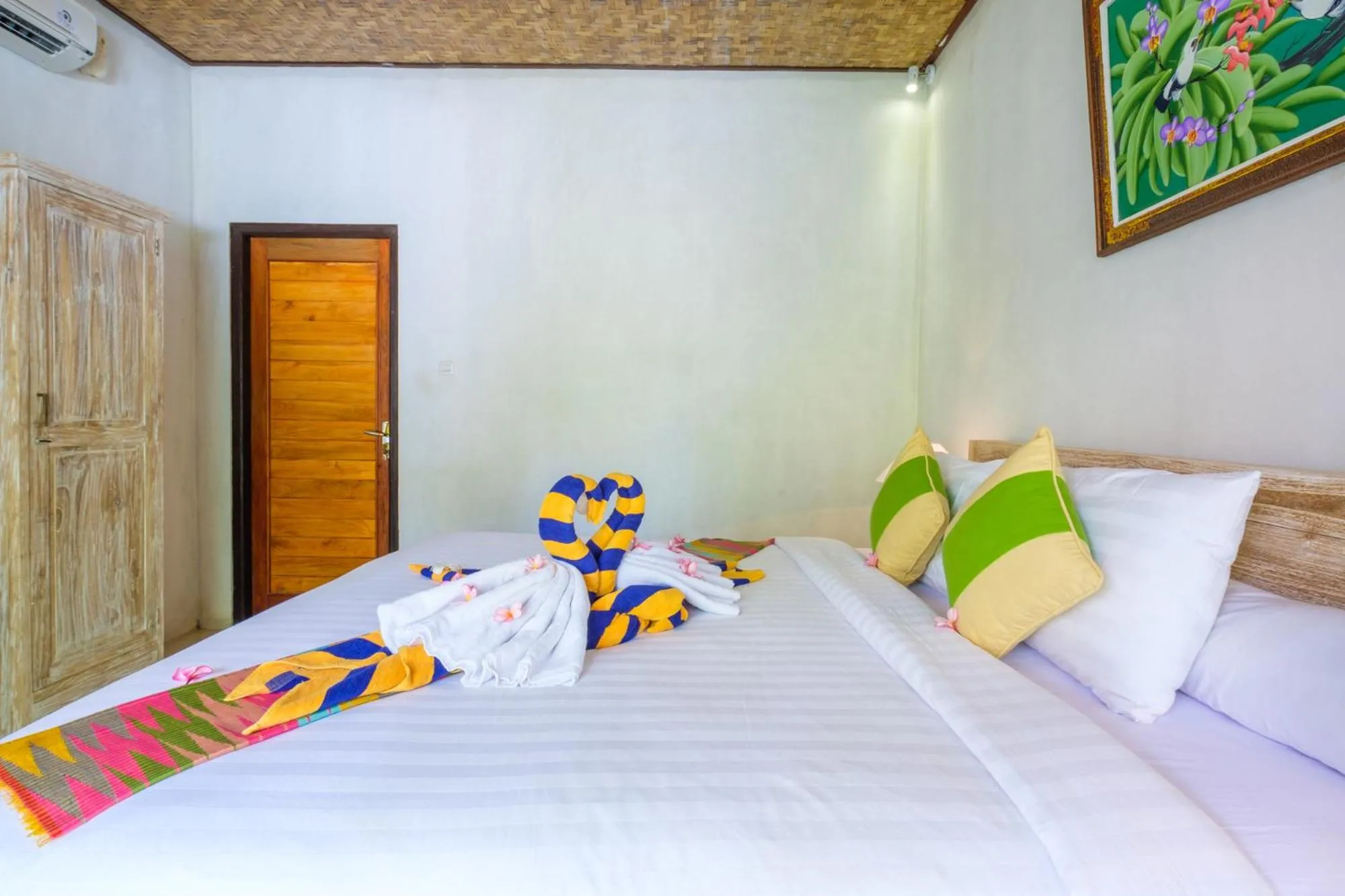 Bed in Crystal Bay Bungalows