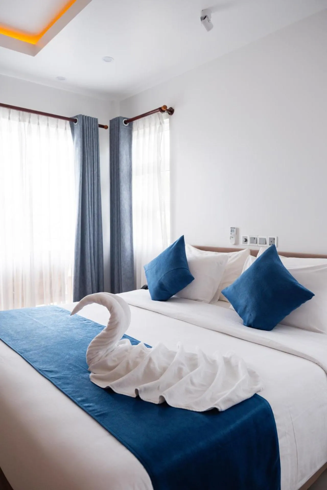 Bed in Reef Edge Thulusdhoo, Maldives