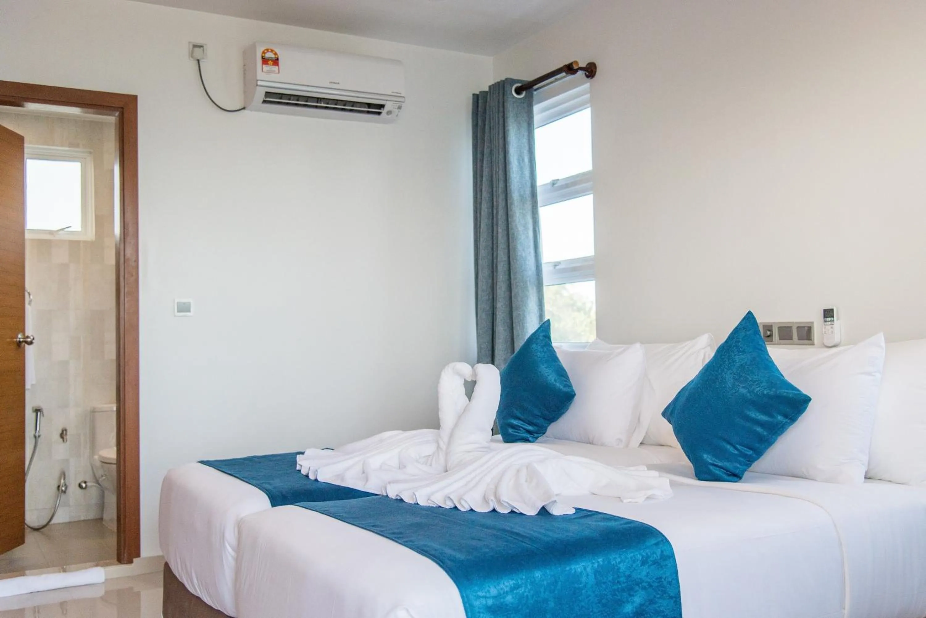 Bed in Reef Edge Thulusdhoo, Maldives