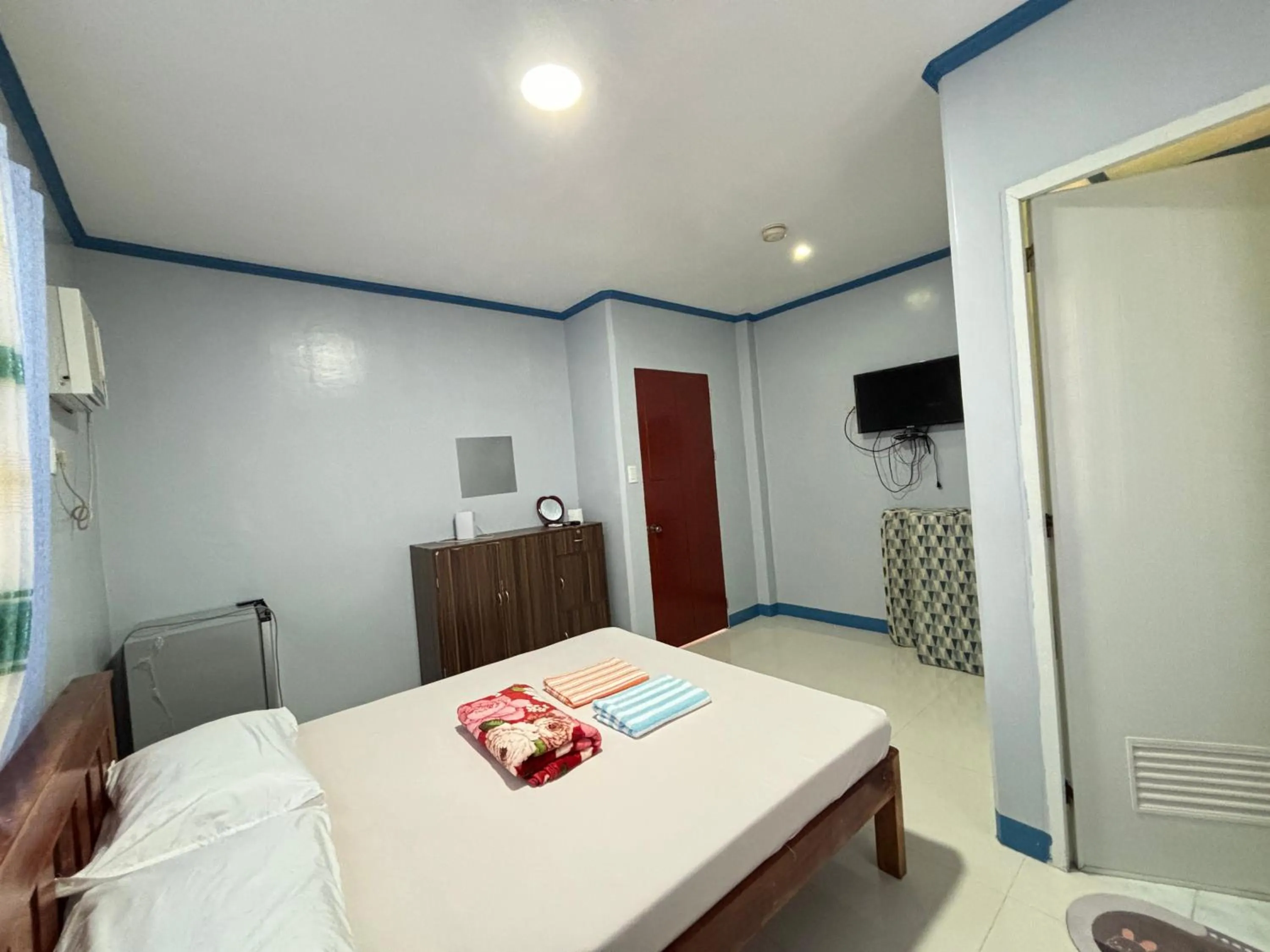 Bed in La Fela Pension House