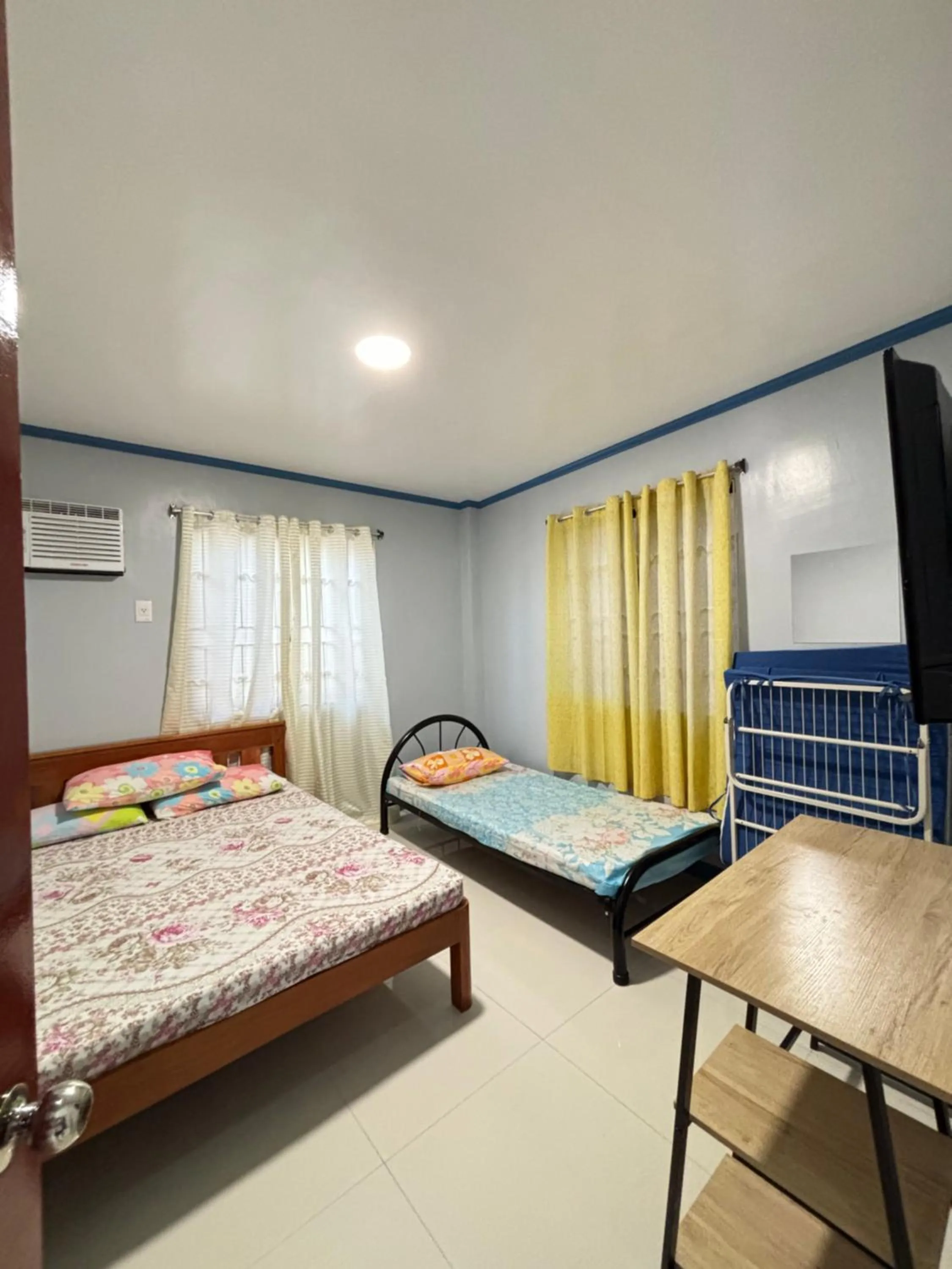 Bed in La Fela Pension House