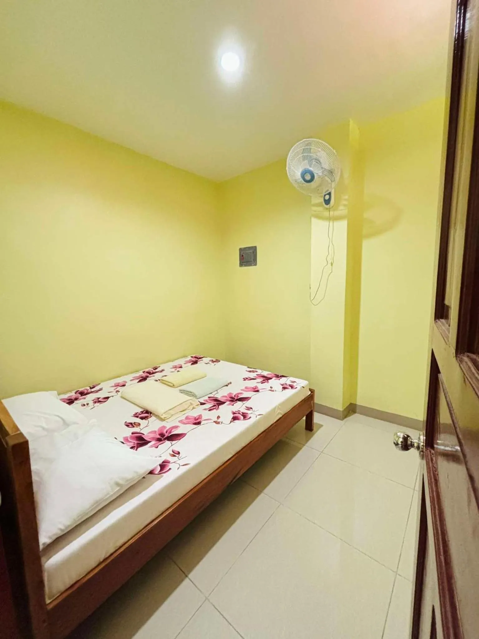 Bed in La Fela Pension House