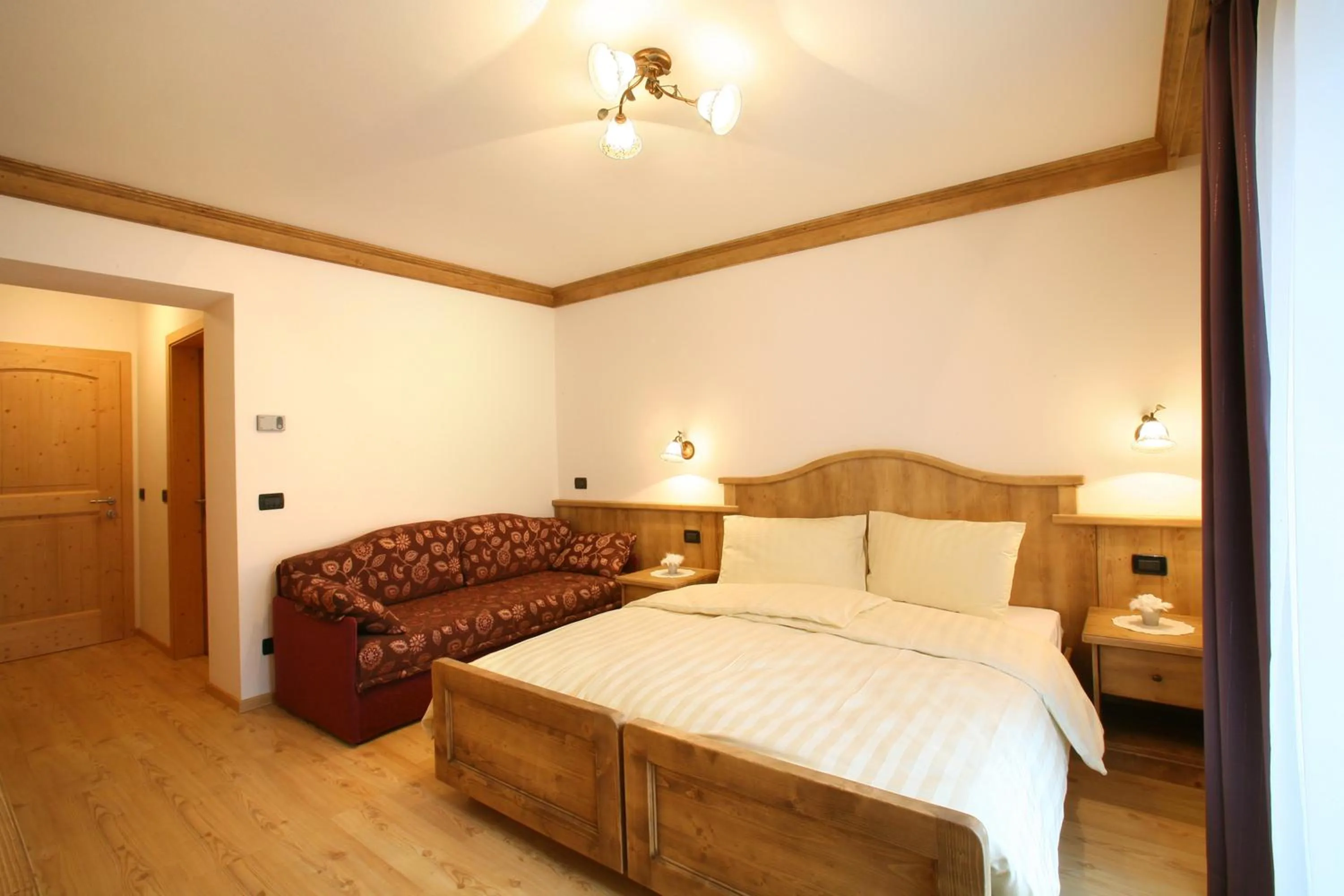 Photo of the whole room, Bed in Garnì Prà Fiorì