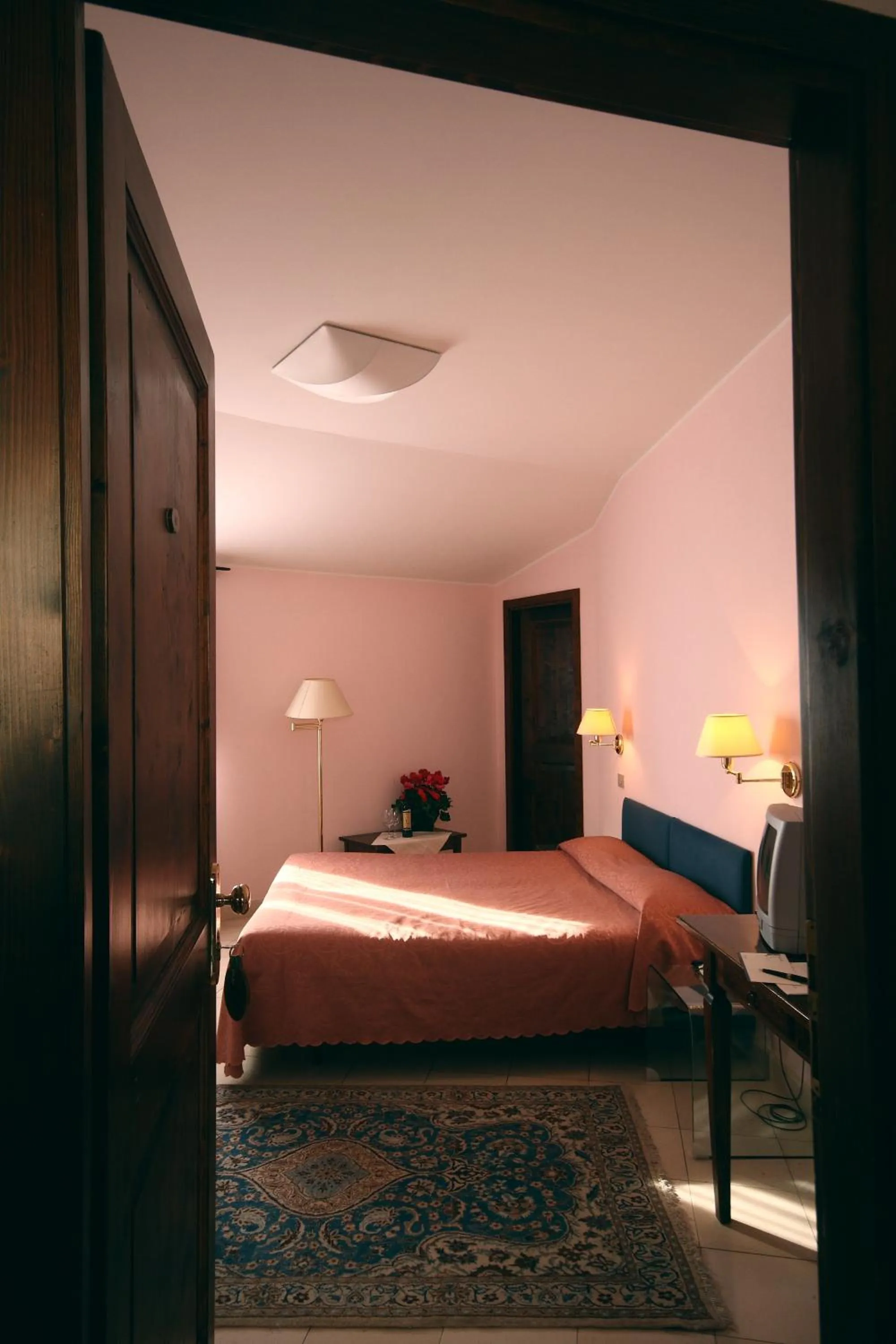 Bed in Casa Oliva Albergo Diffuso